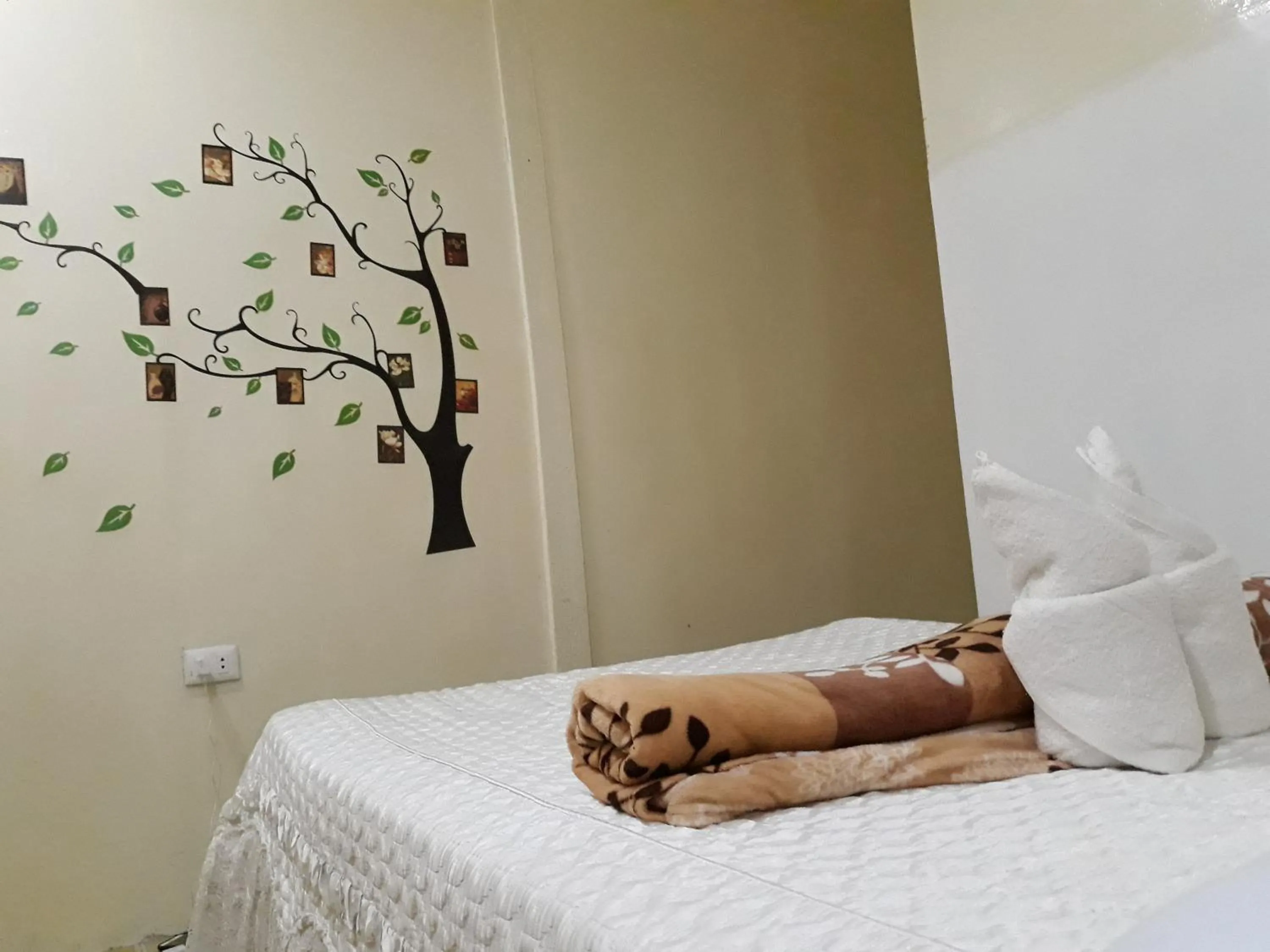 Bed in Villa Encantador Resort