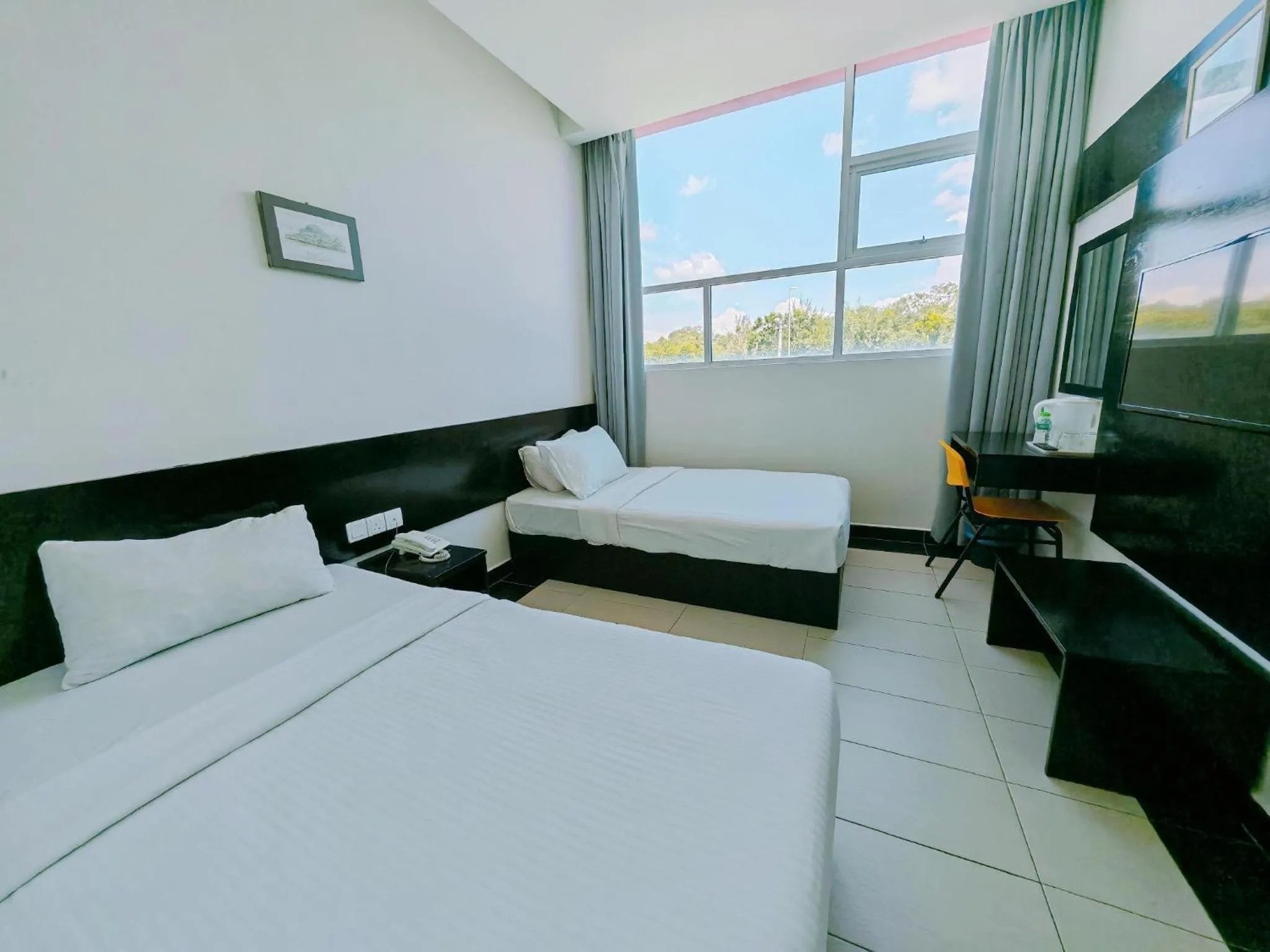 Bed in Citrine Hotel
