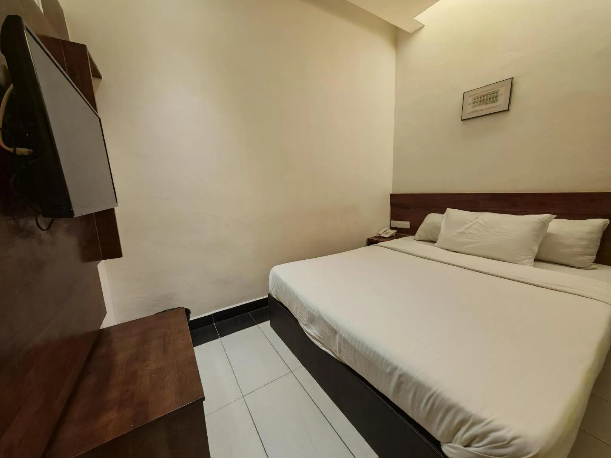 Bed in Citrine Hotel