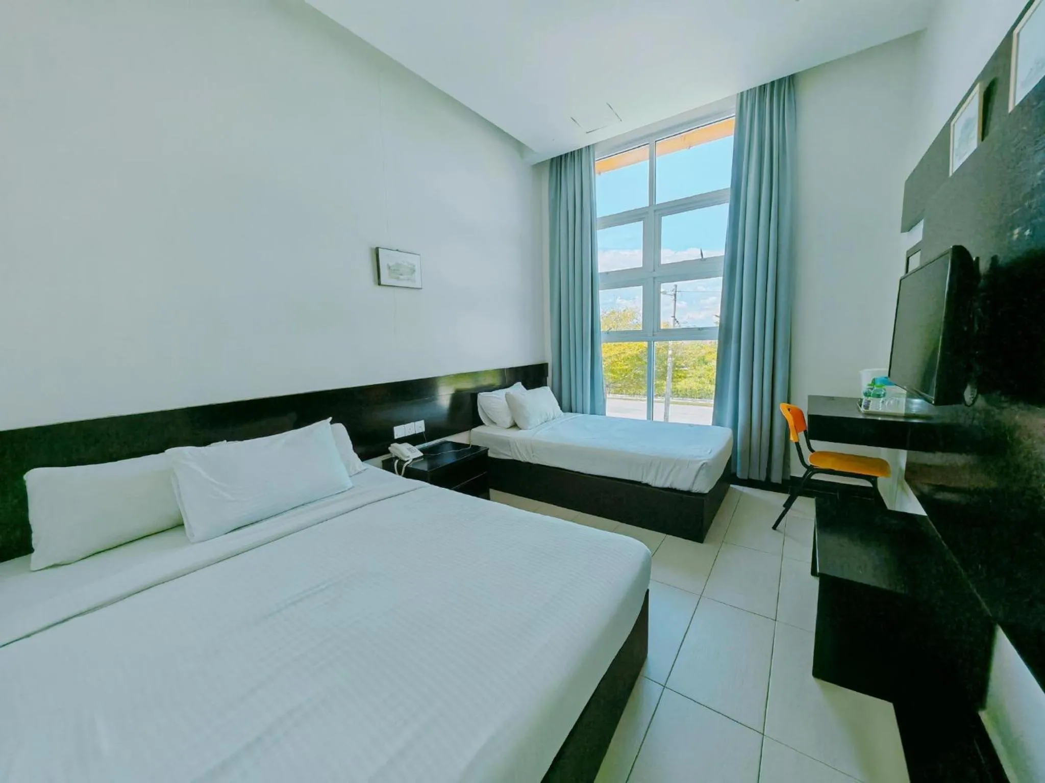 Bed in Citrine Hotel