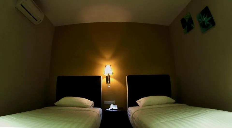 Bed in Ayer Hitam Hotel