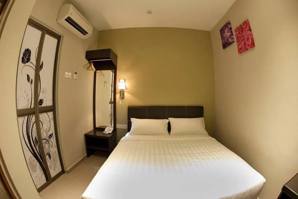 Bed in Ayer Hitam Hotel