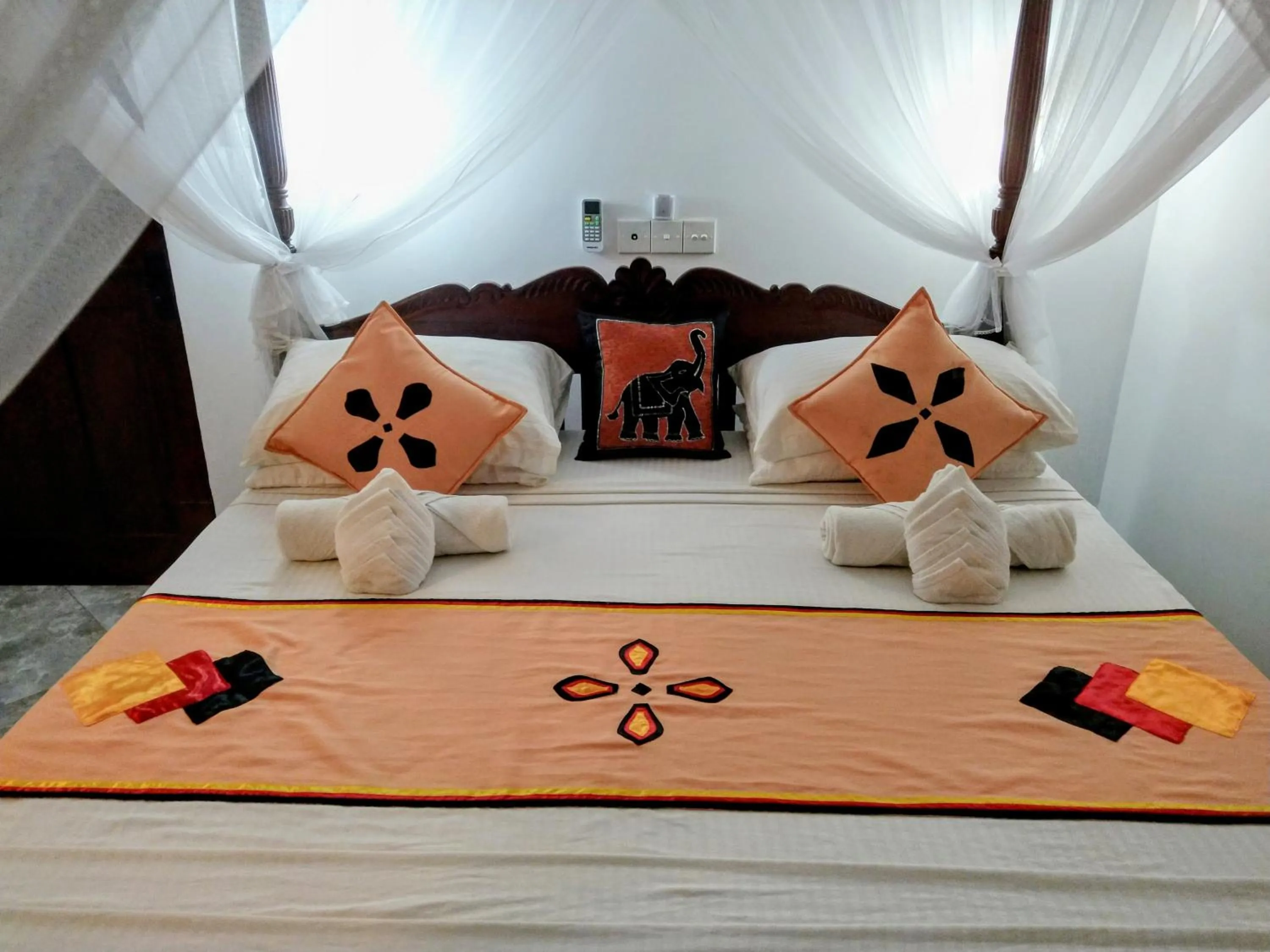 Bed in Lucky Prince Villa & Ayurveda Wellness