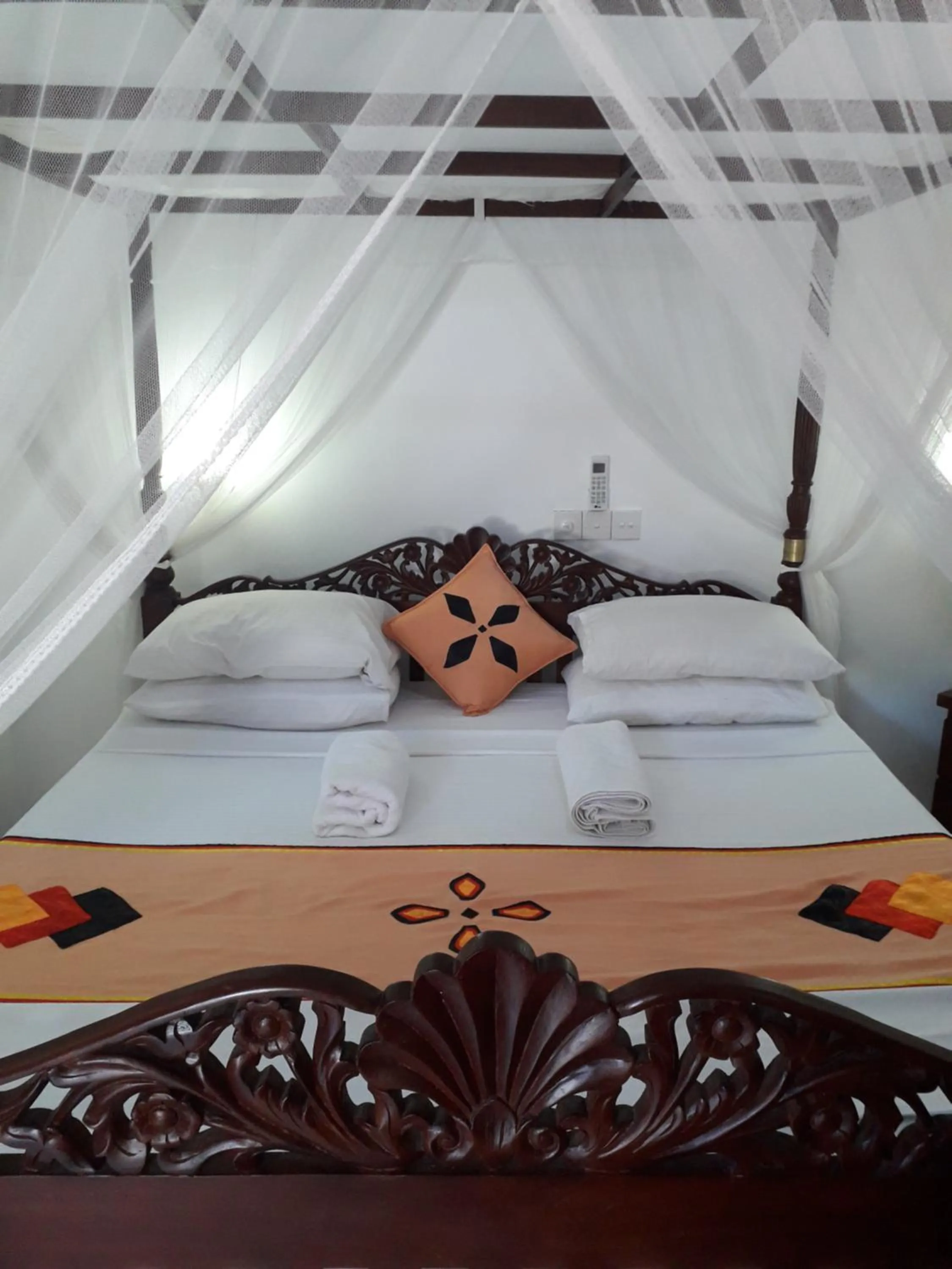 Bed in Lucky Prince Villa & Ayurveda Wellness