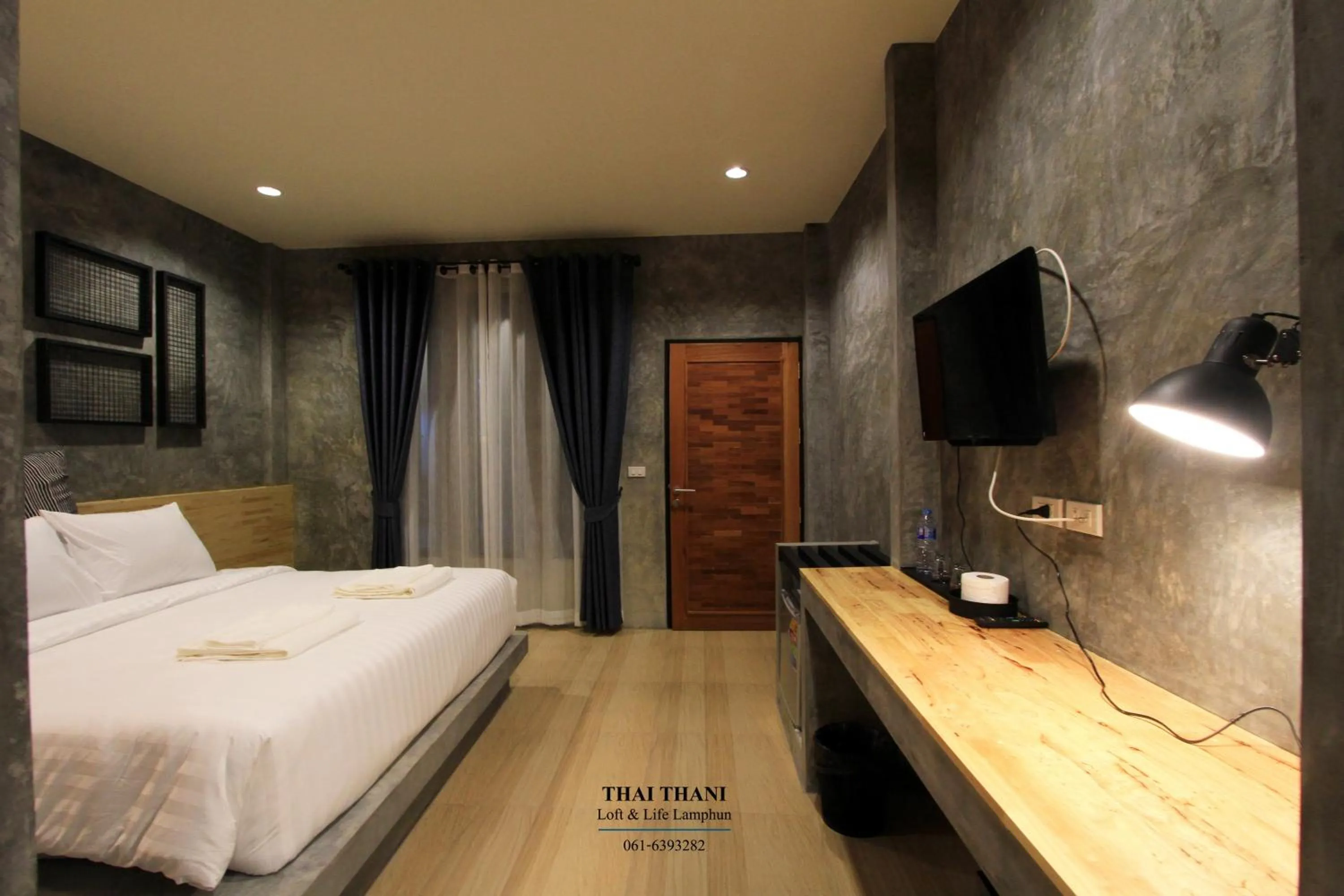 Bed in THAI THANI Loft & Life Lamphun