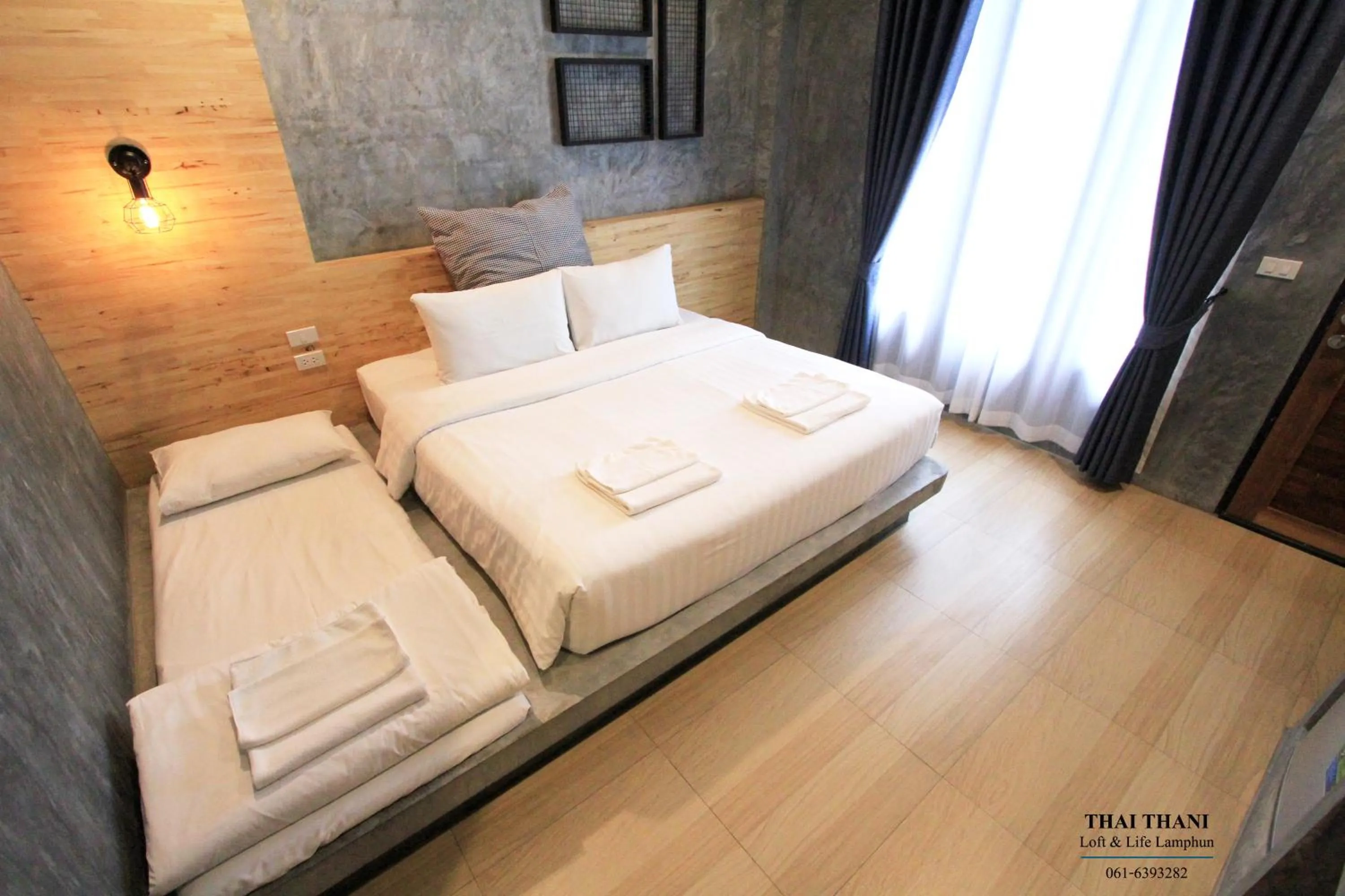 Bed in THAI THANI Loft & Life Lamphun