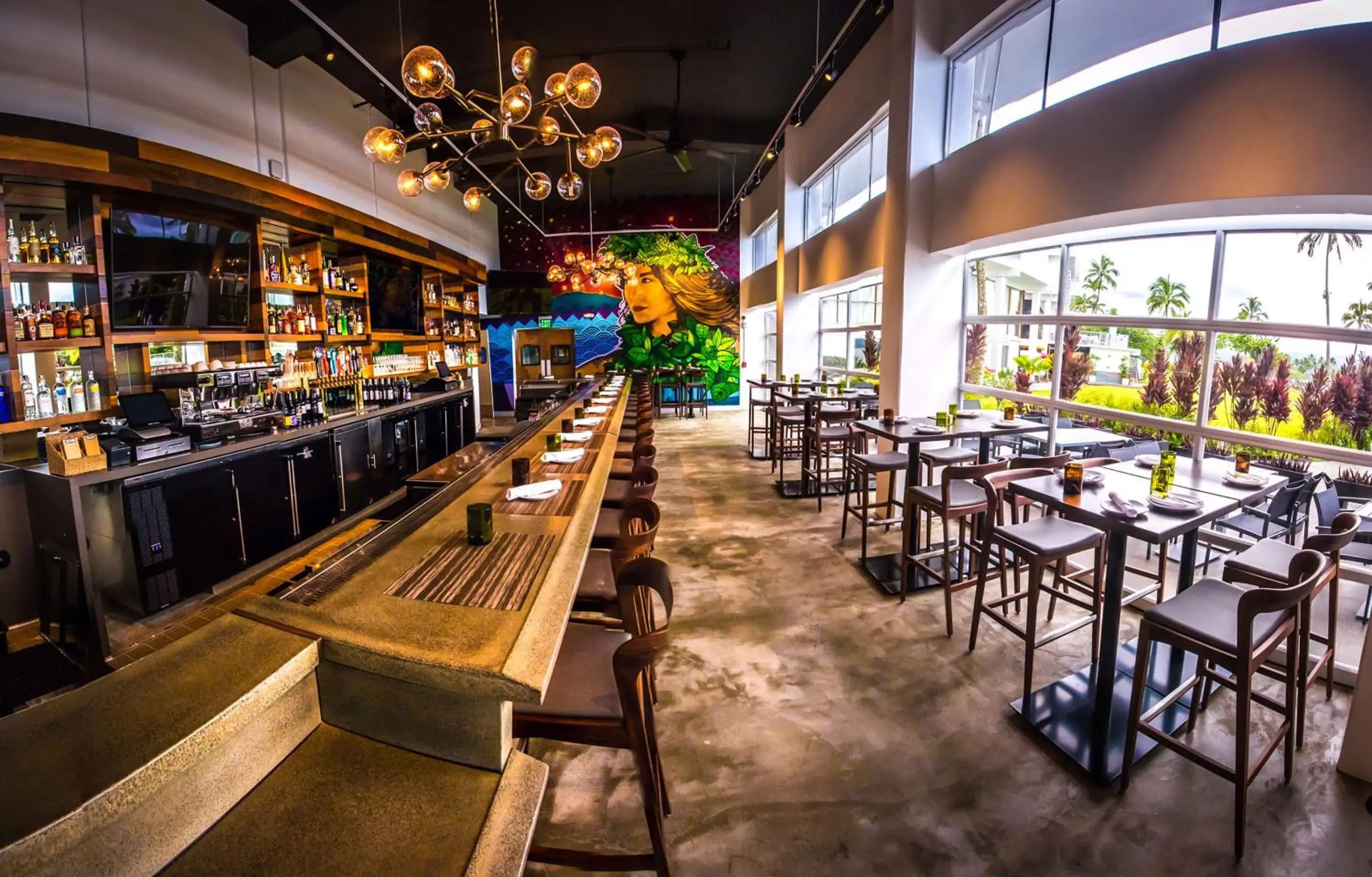 Lounge or bar in Grand Naniloa Hotel, a Doubletree by Hilton Lounge or bar in Grand Naniloa Hotel, a Doubletree by Hilton
