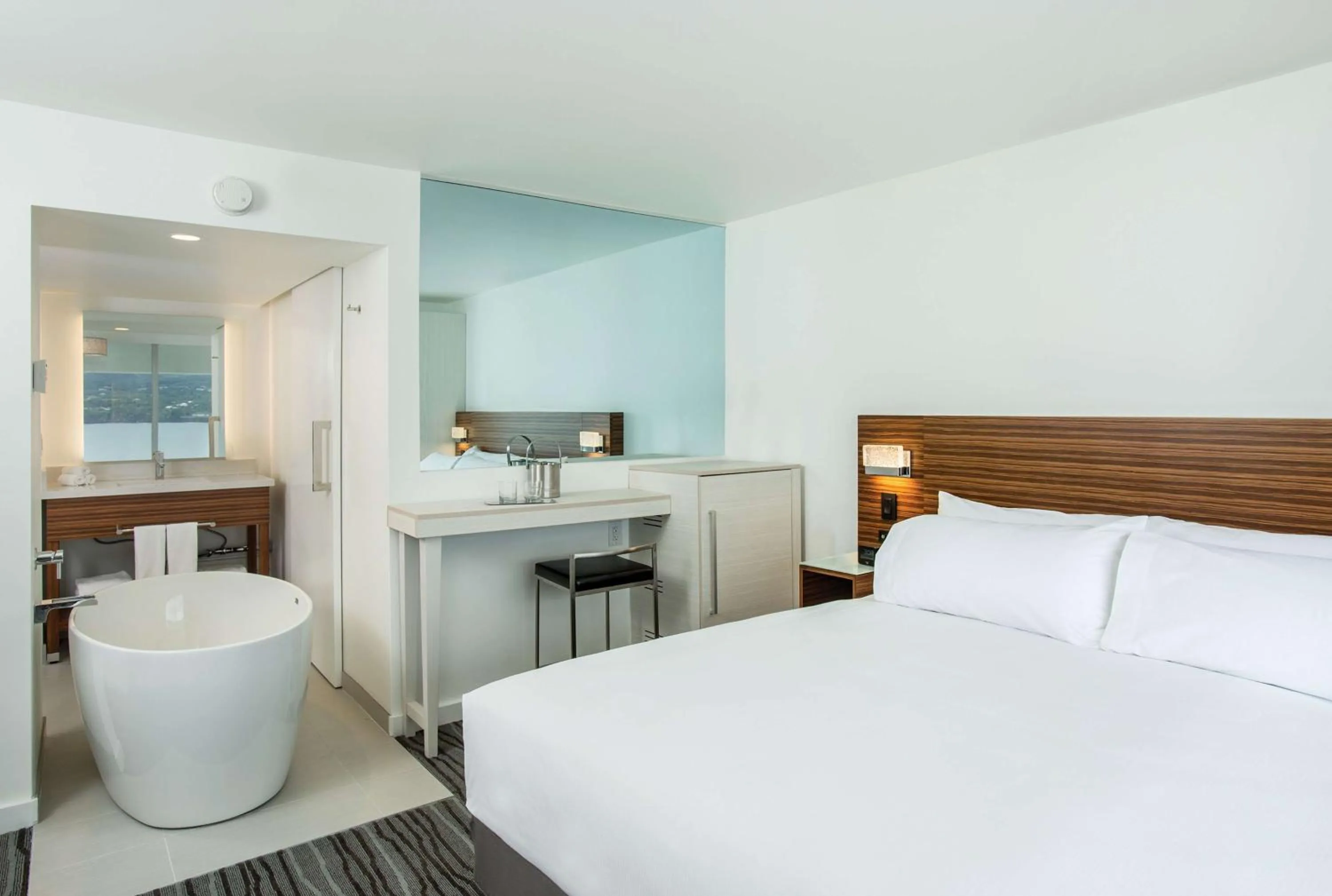 Bathroom, Bed in Grand Naniloa Hotel, a Doubletree by Hilton