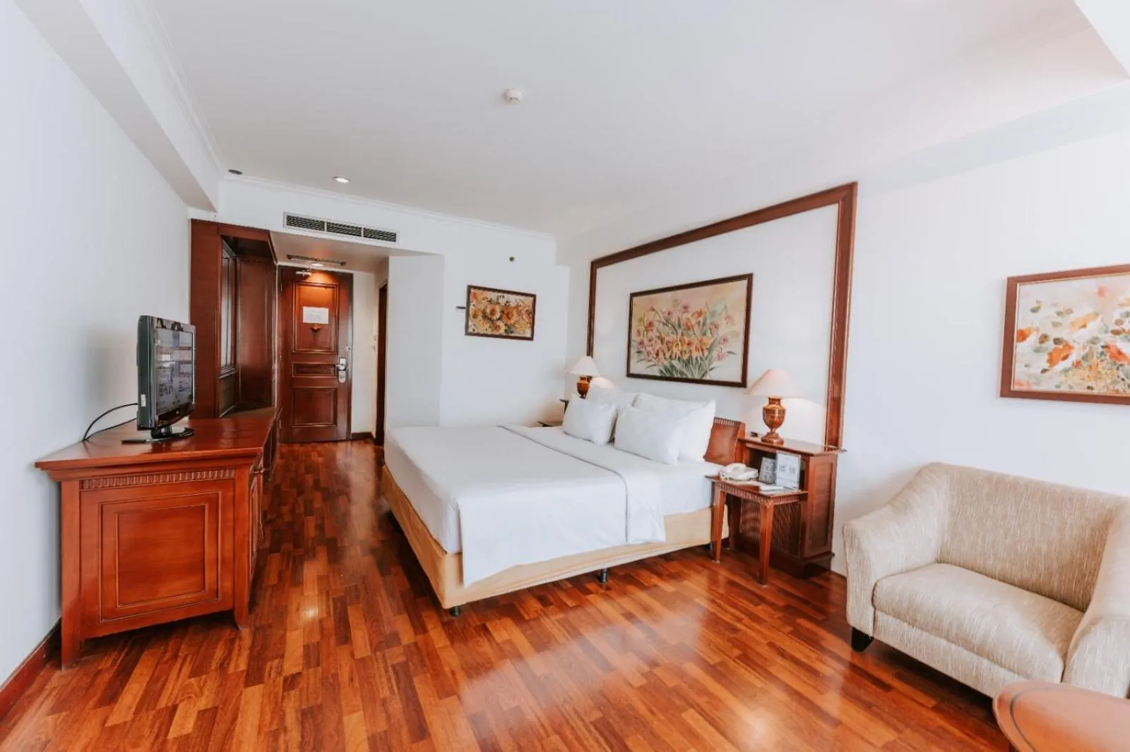 Bed in Arion Suites Hotel