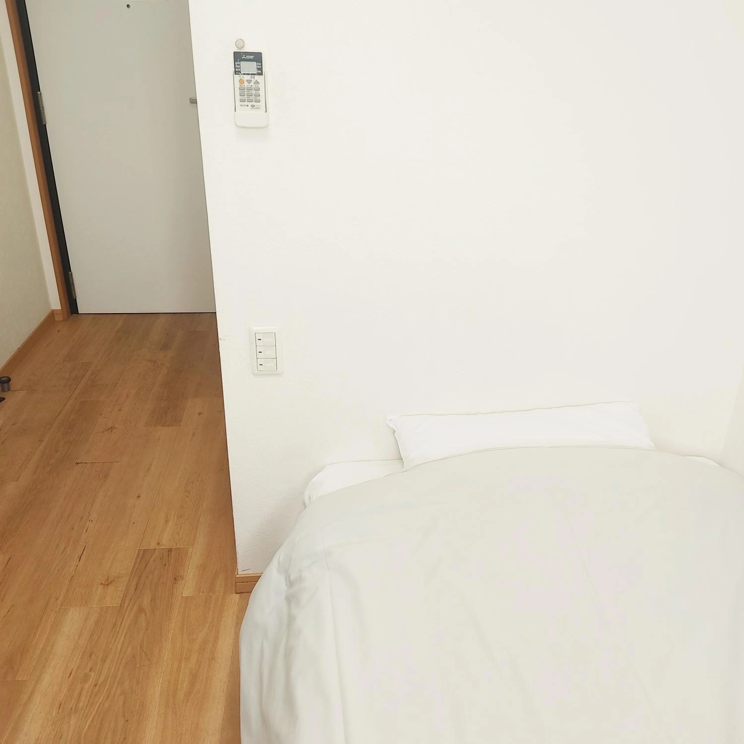 Bed in Hotel Chuo Oasis