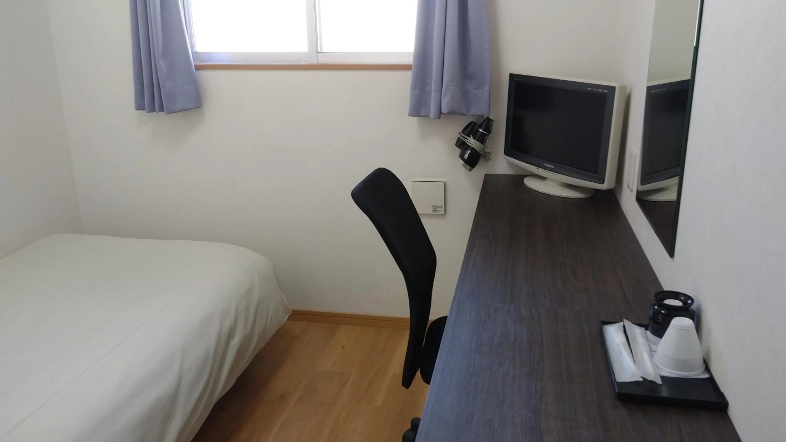 Photo of the whole room, Bed in Hotel Chuo Oasis