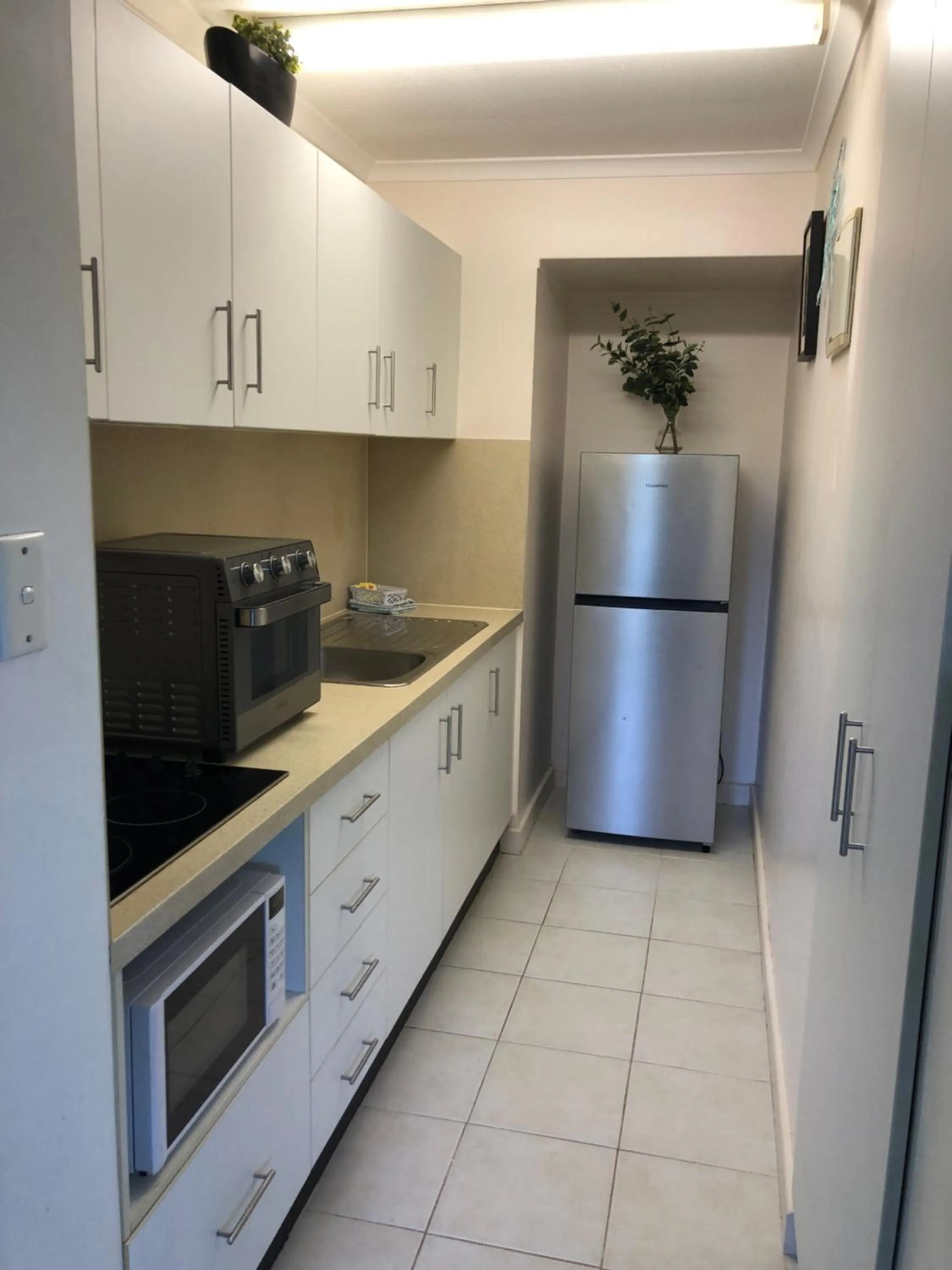 Kitchen or kitchenette in Coral Towers Holiday Suites