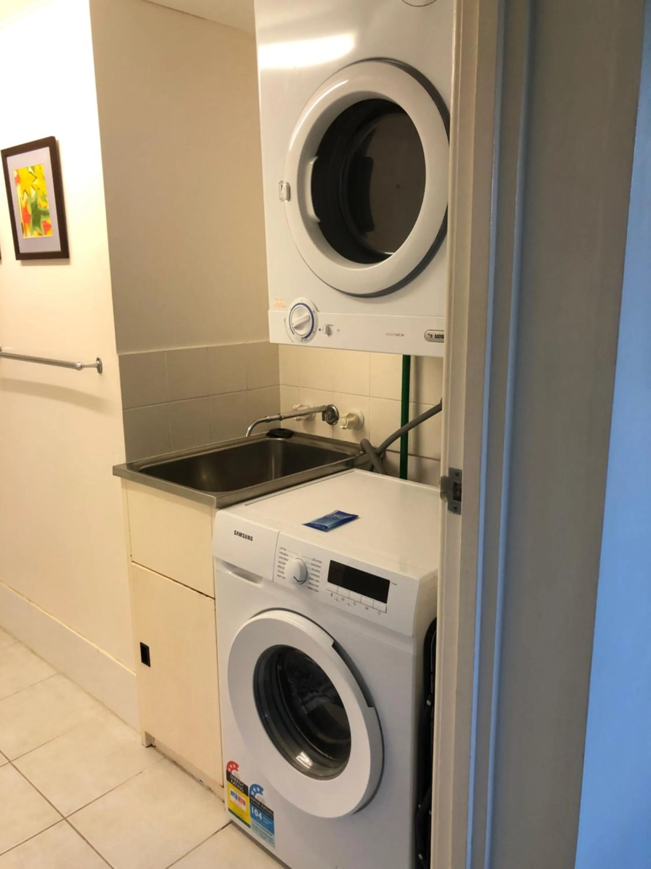 washing machine in Coral Towers Holiday Suites