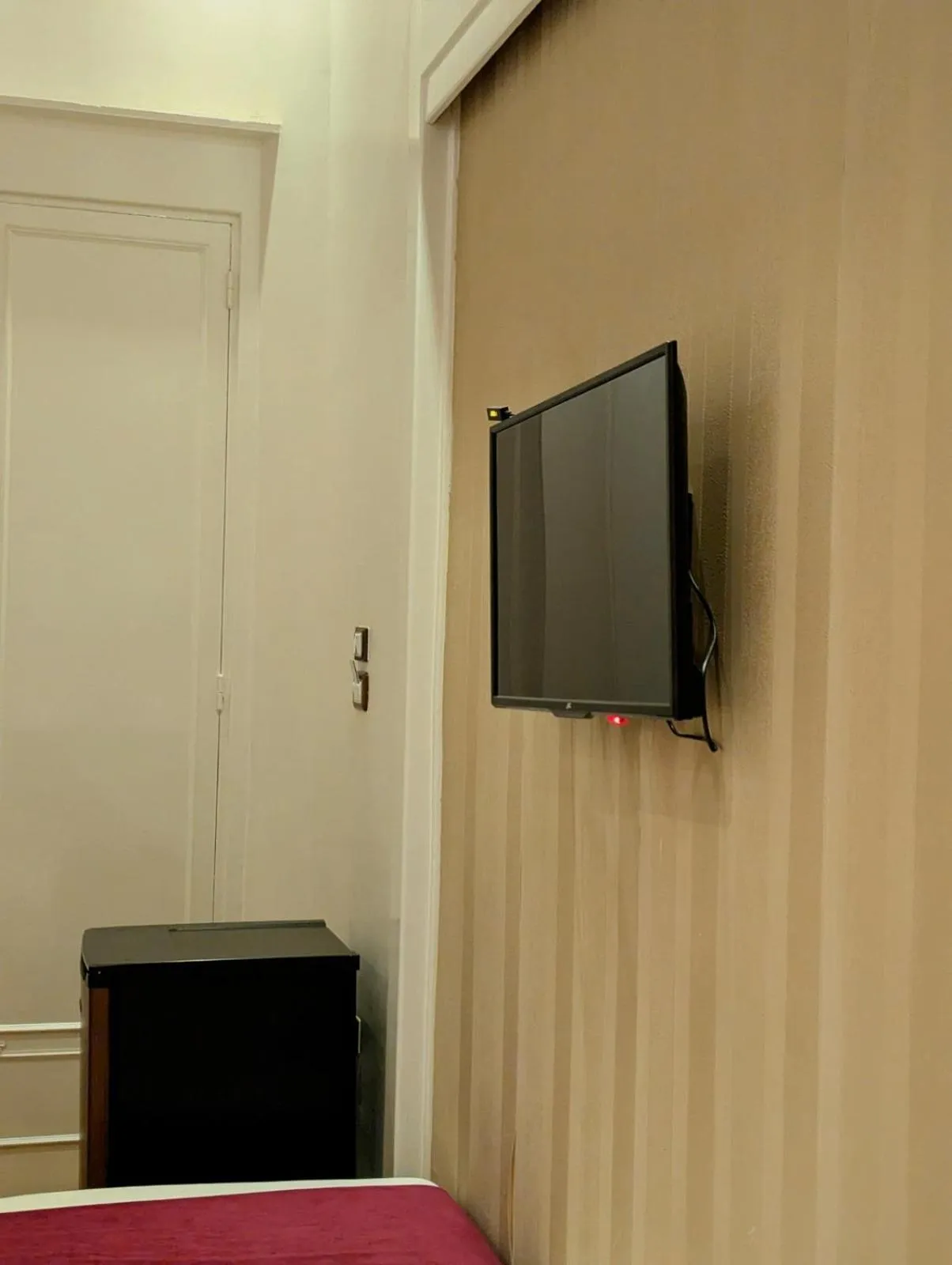 Communal lounge/ TV room in Nour Hostel