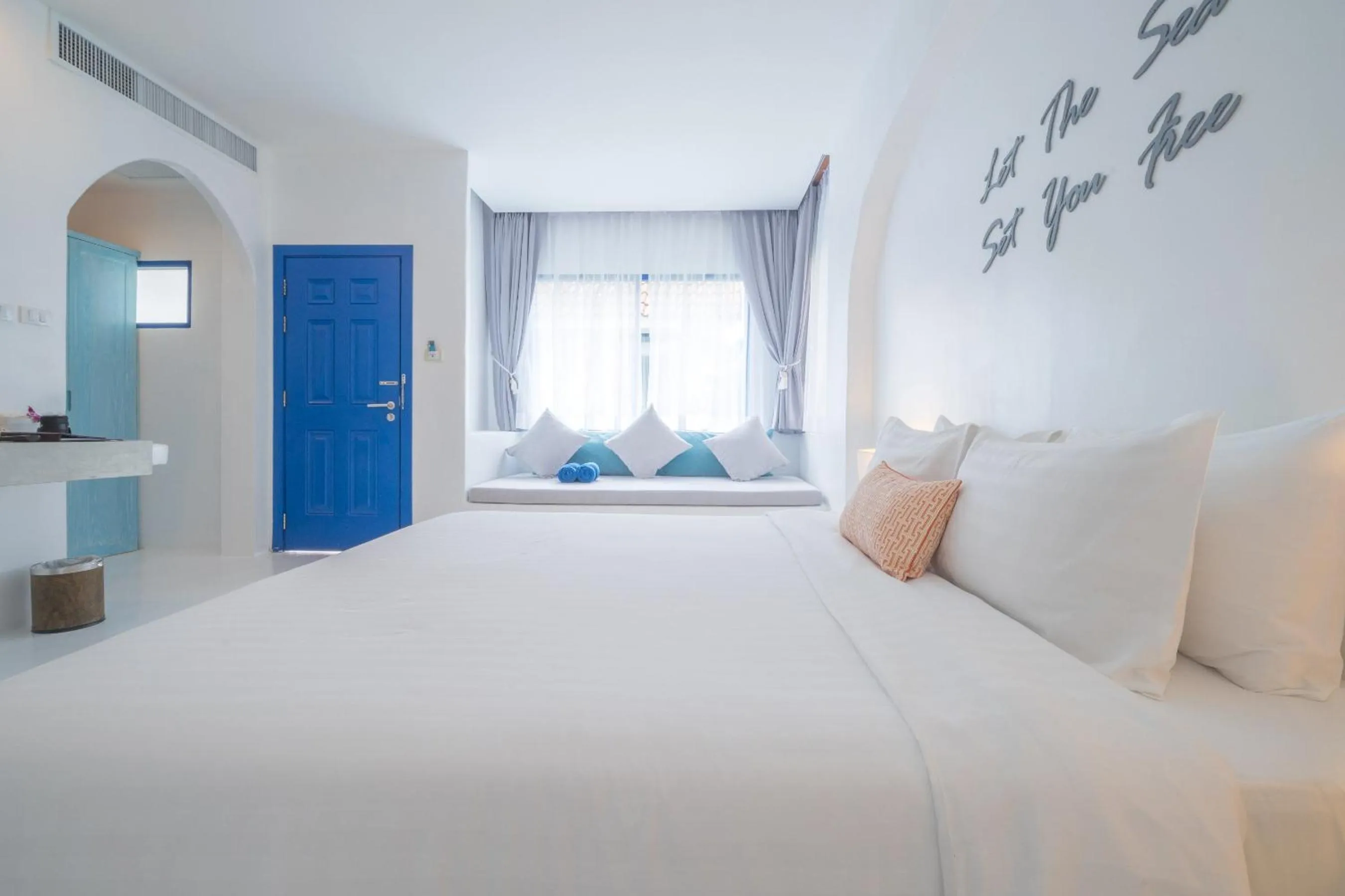 Bed in Ocean Breeze Resort Khaolak