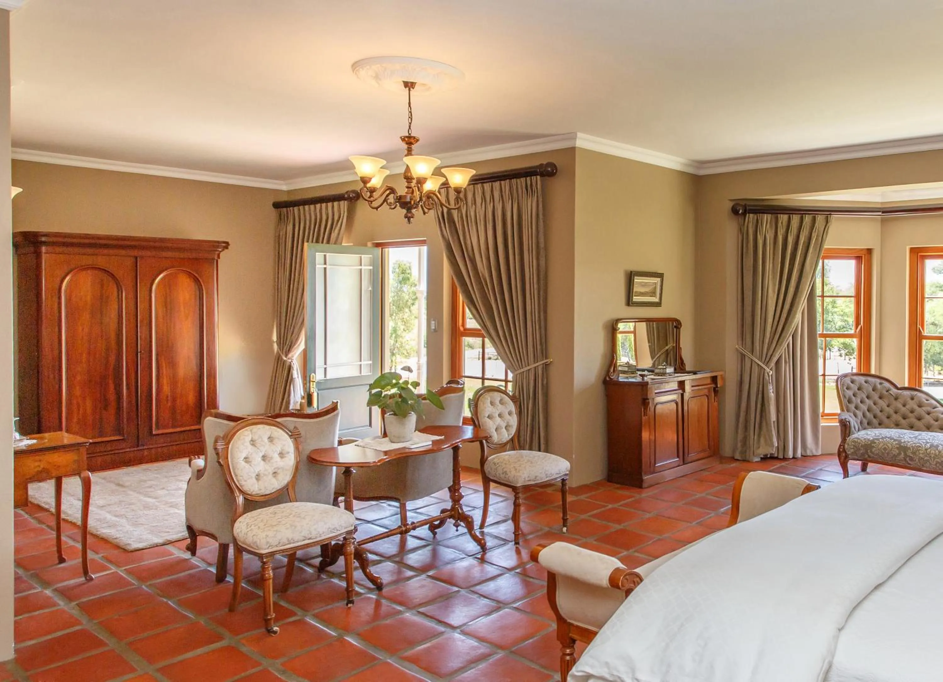 Living room, Bed in La Plume Boutique Hotel & Spa