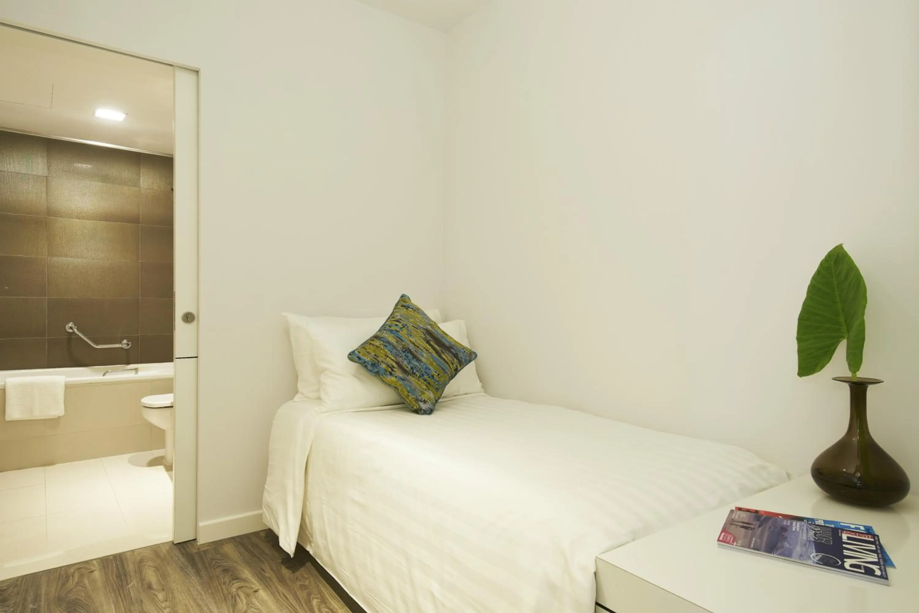 Bed in PARKROYAL Serviced Suites Singapore