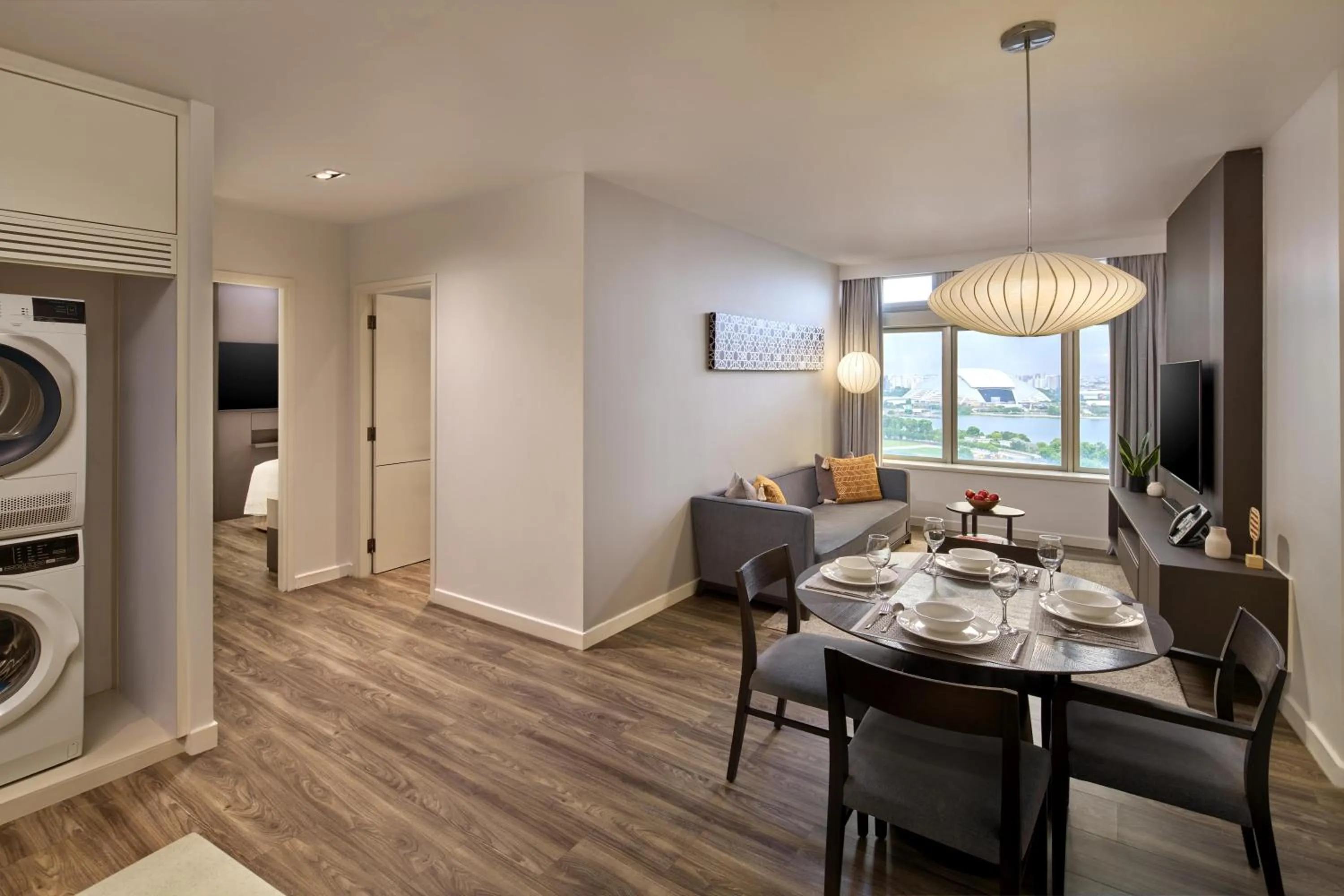 Communal lounge/ TV room in PARKROYAL Serviced Suites Singapore