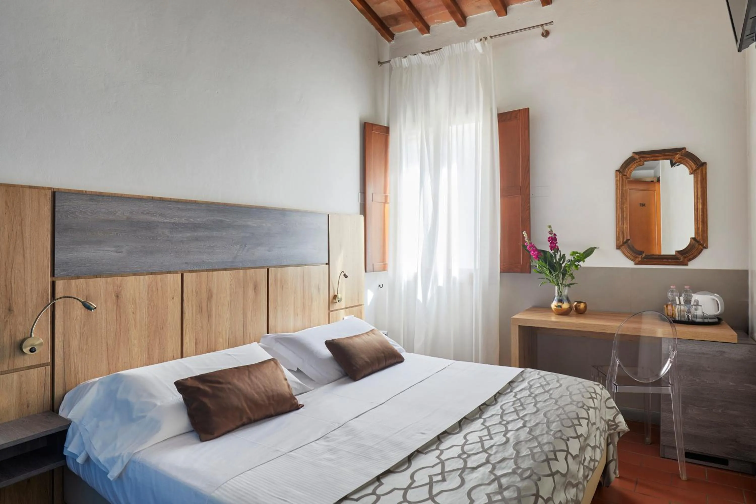 Bed in Sette Angeli Rooms