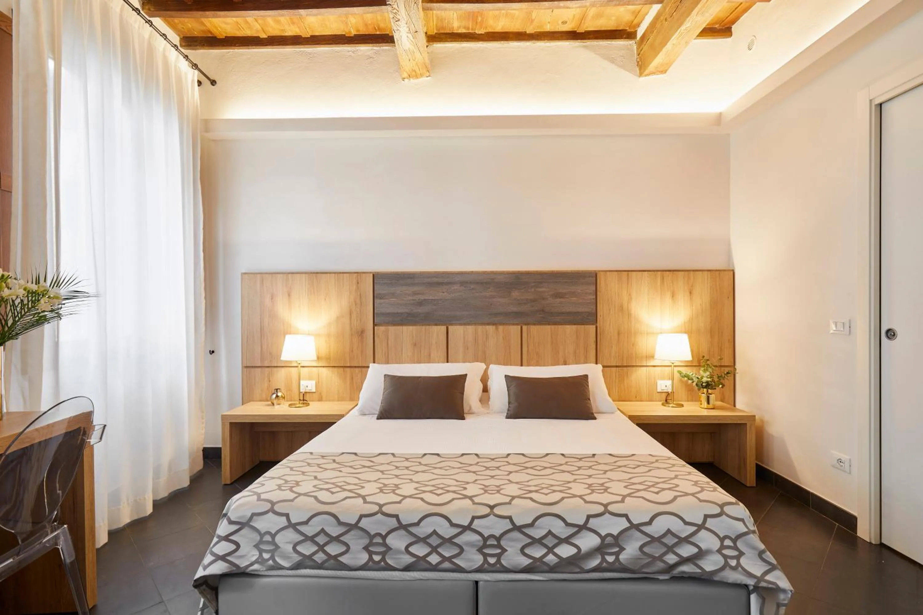 Bed in Sette Angeli Rooms