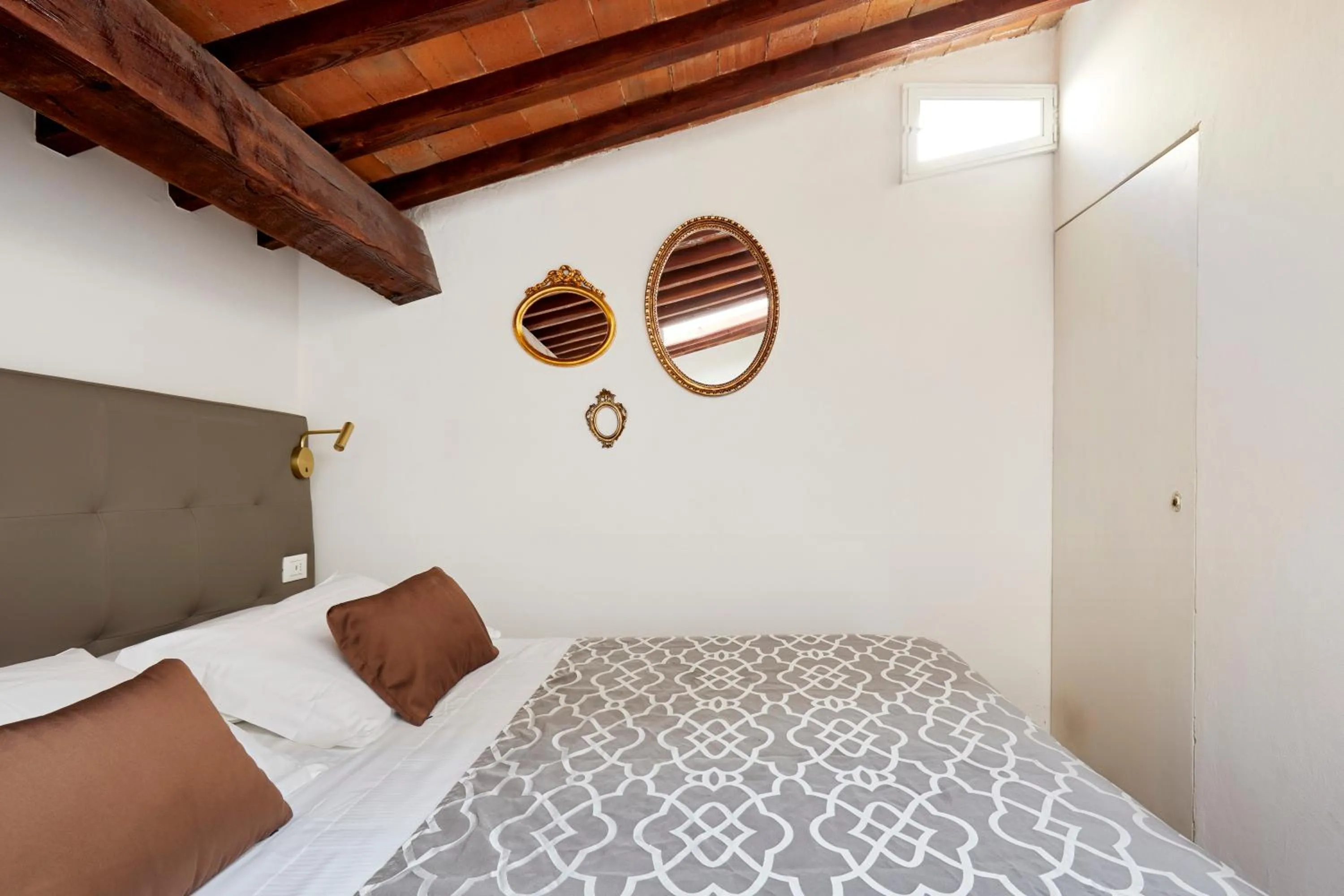 Bed in Sette Angeli Rooms