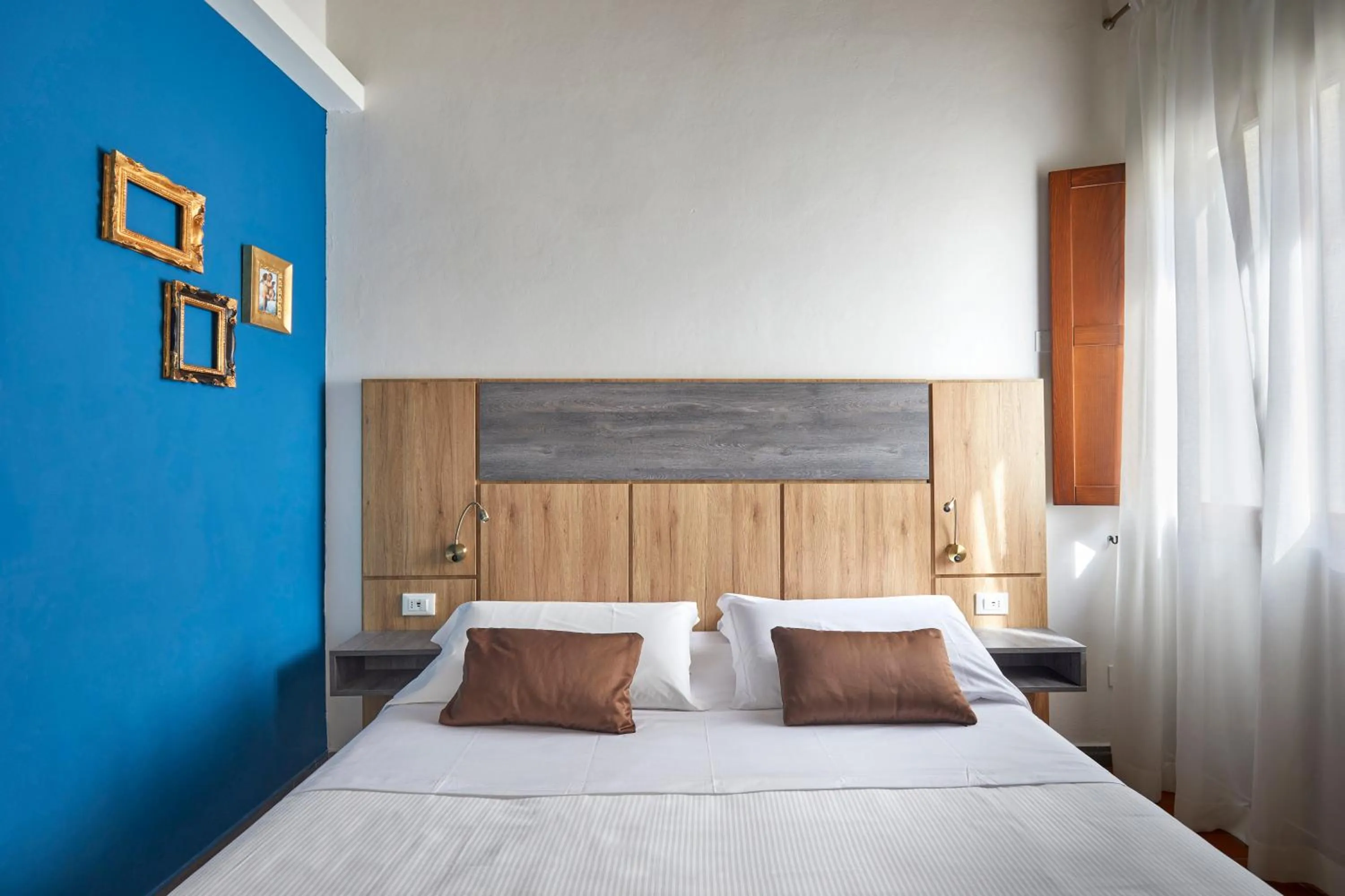 Bed in Sette Angeli Rooms