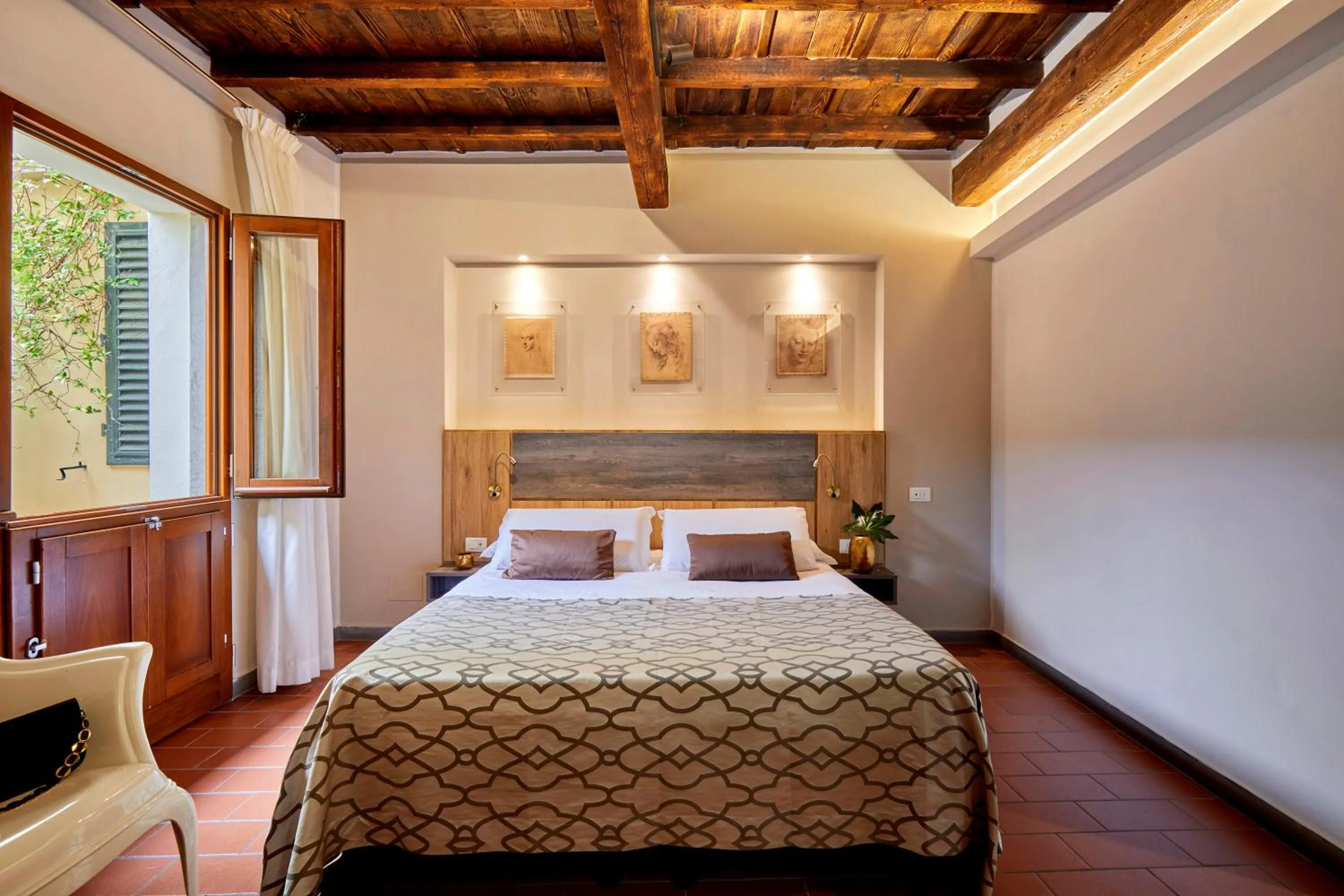 Bed in Sette Angeli Rooms