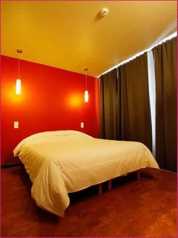 Bed in Hotel O Mal Aime