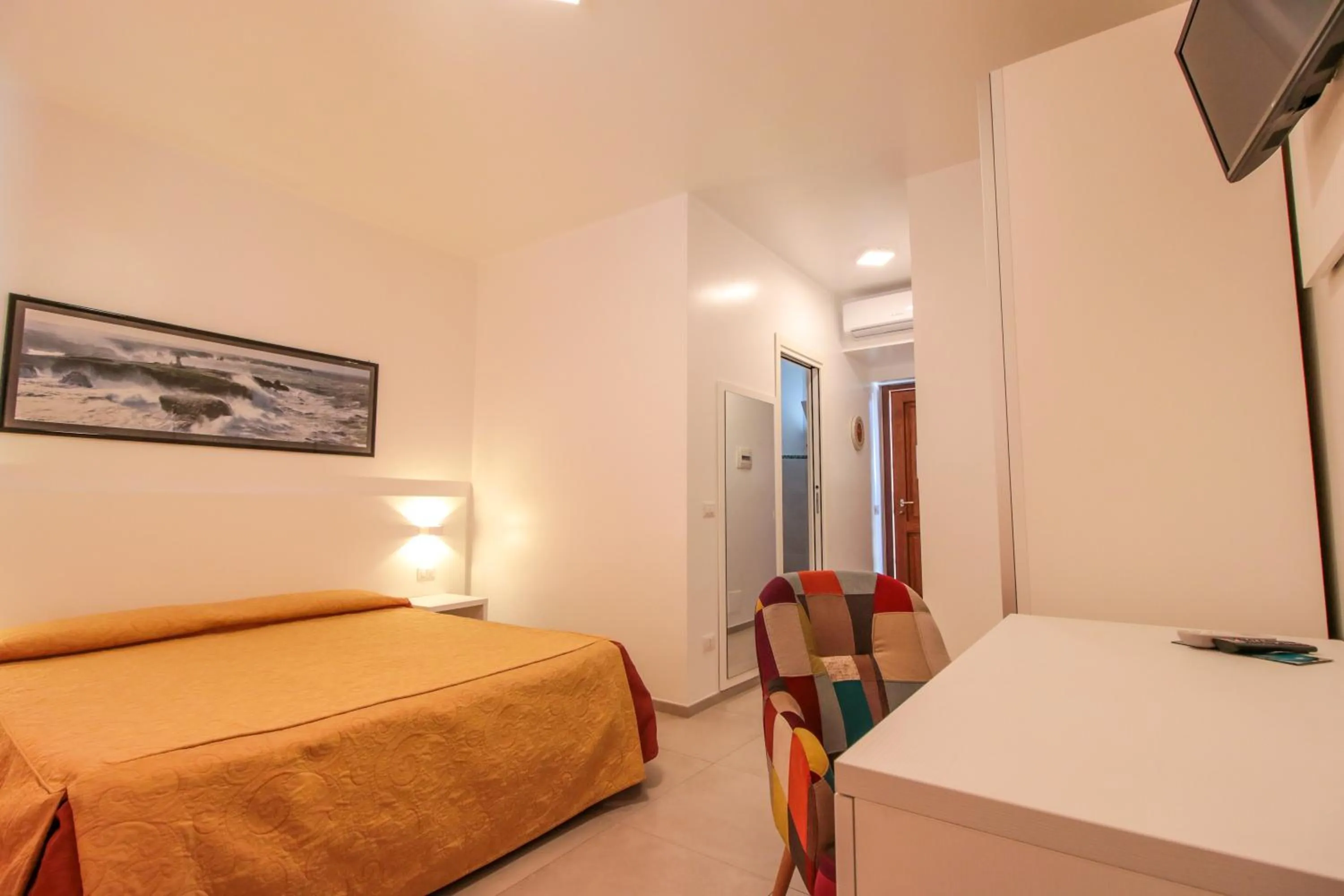 Bed in Hotel Il Faro Della Guitgia Tommasino