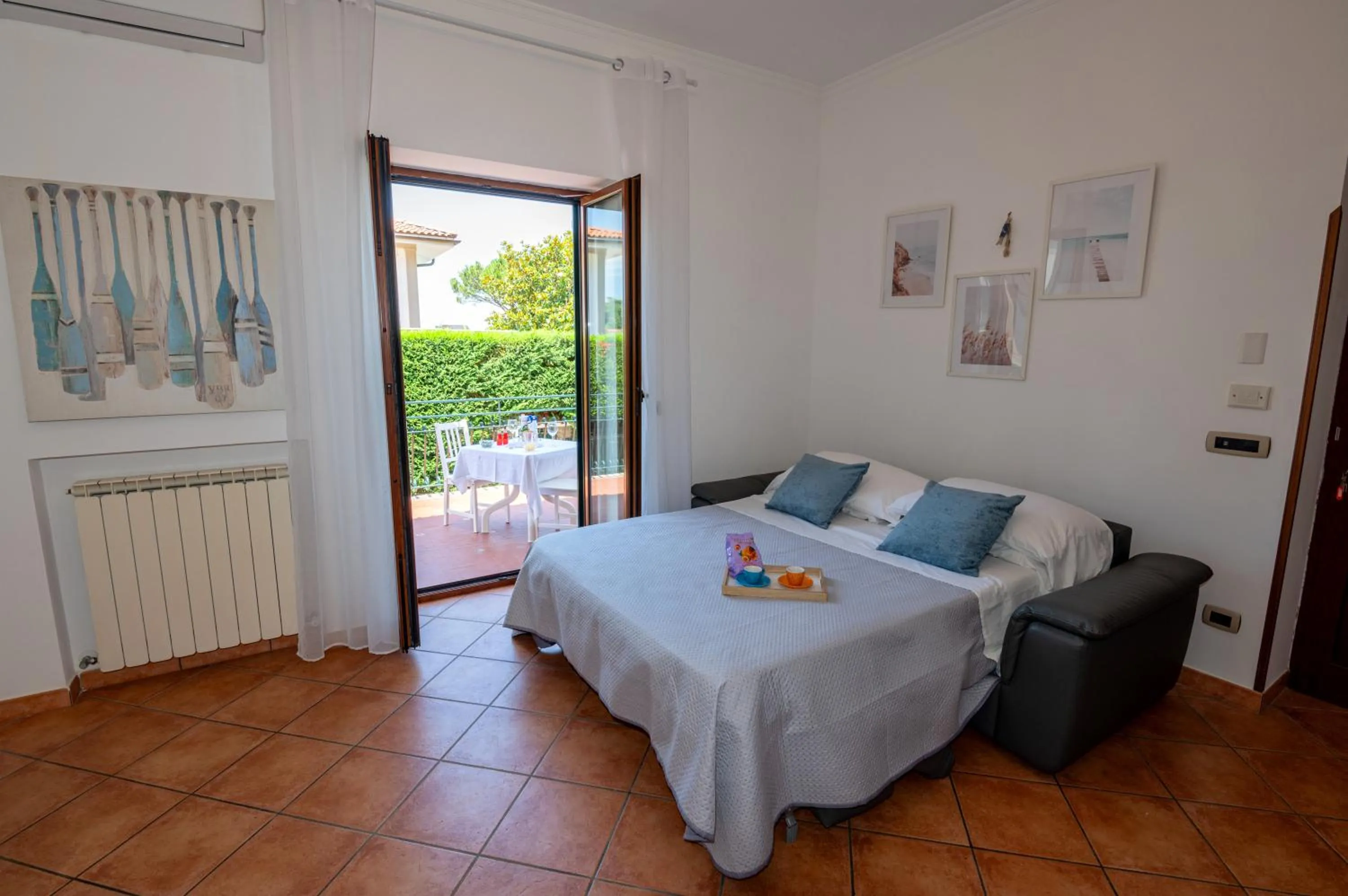 Living room, Bed in Maison Cipriani