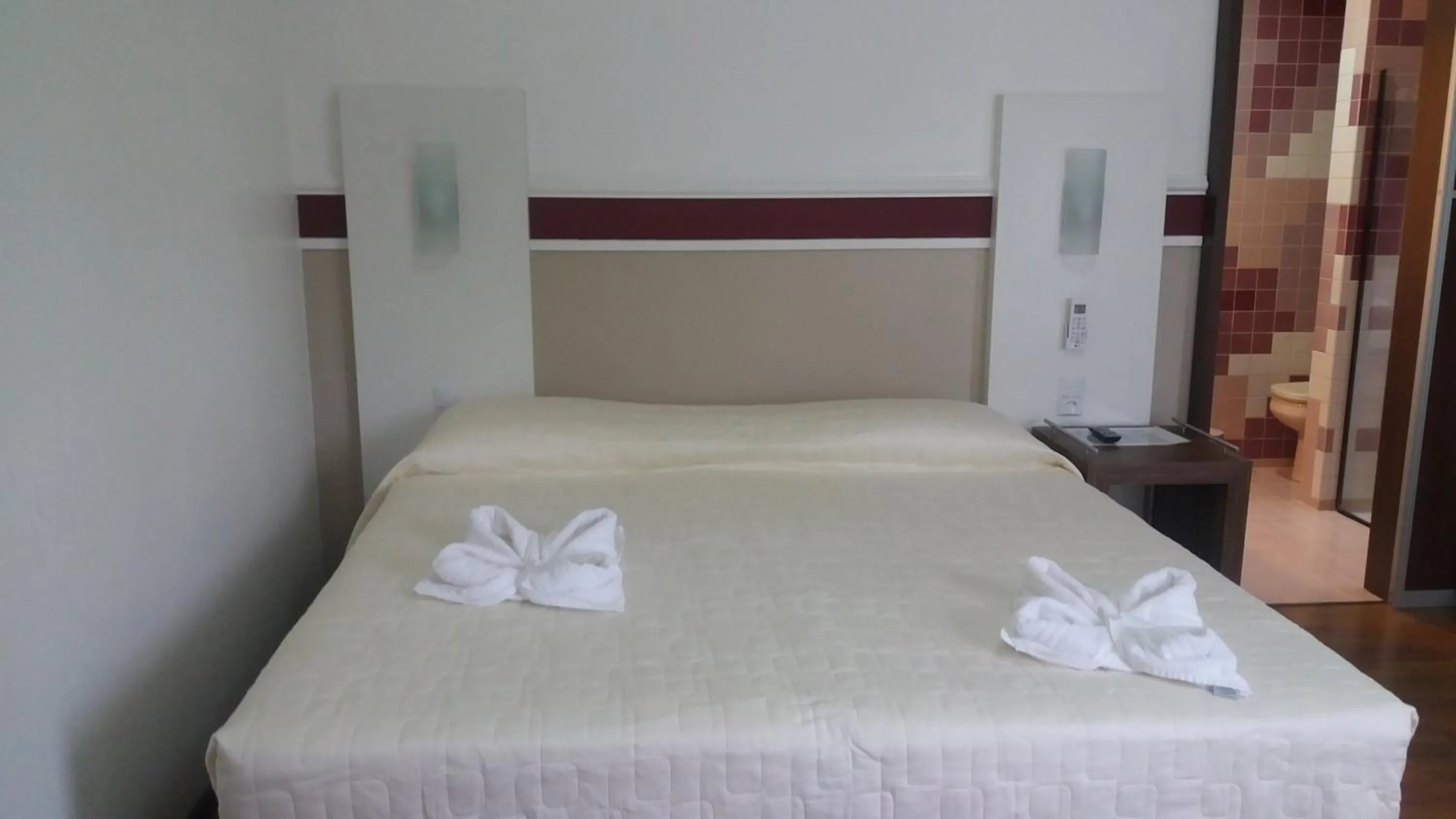 Shower, Bed in Pousada by Rieger