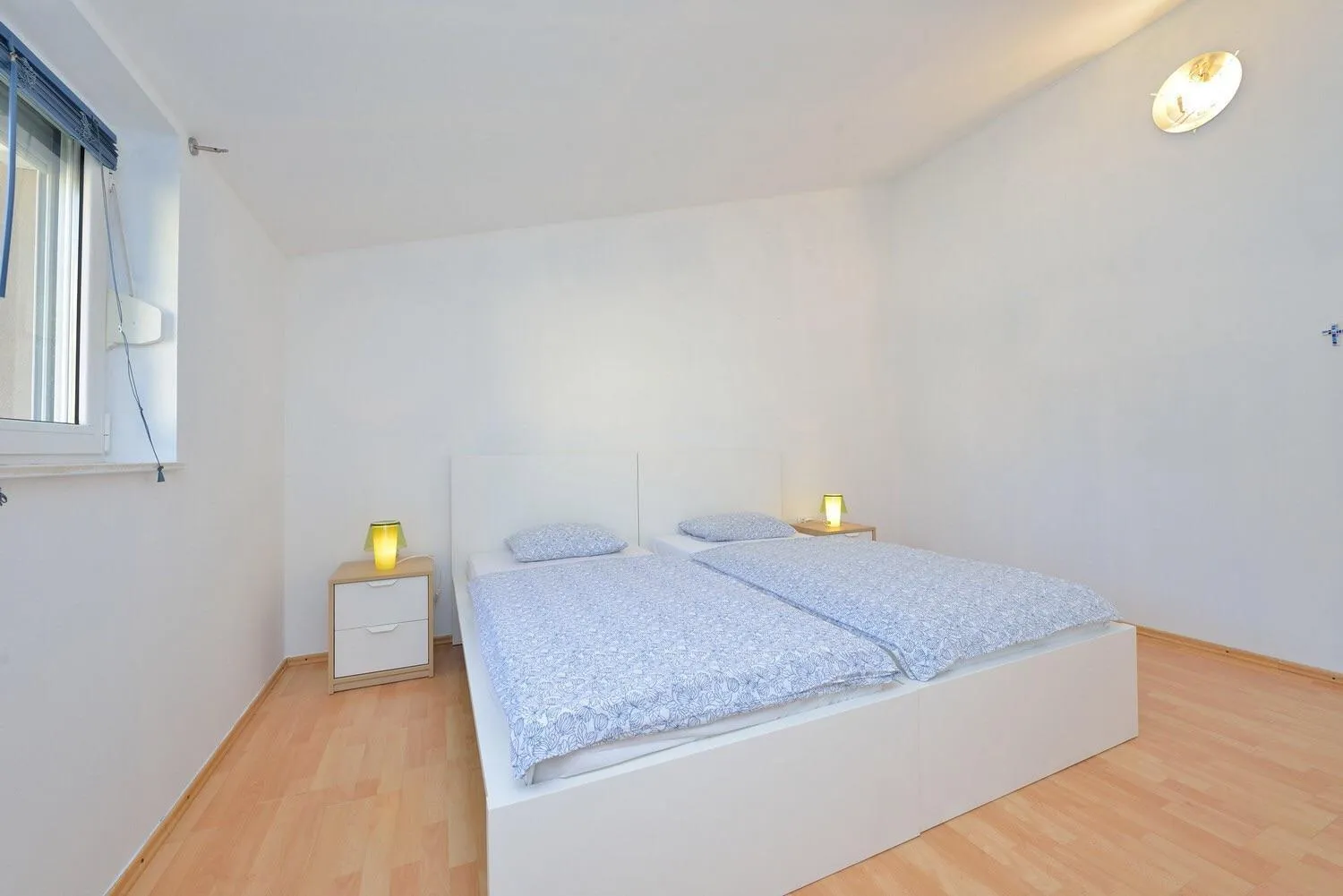 Bed in Apartments Yvonne