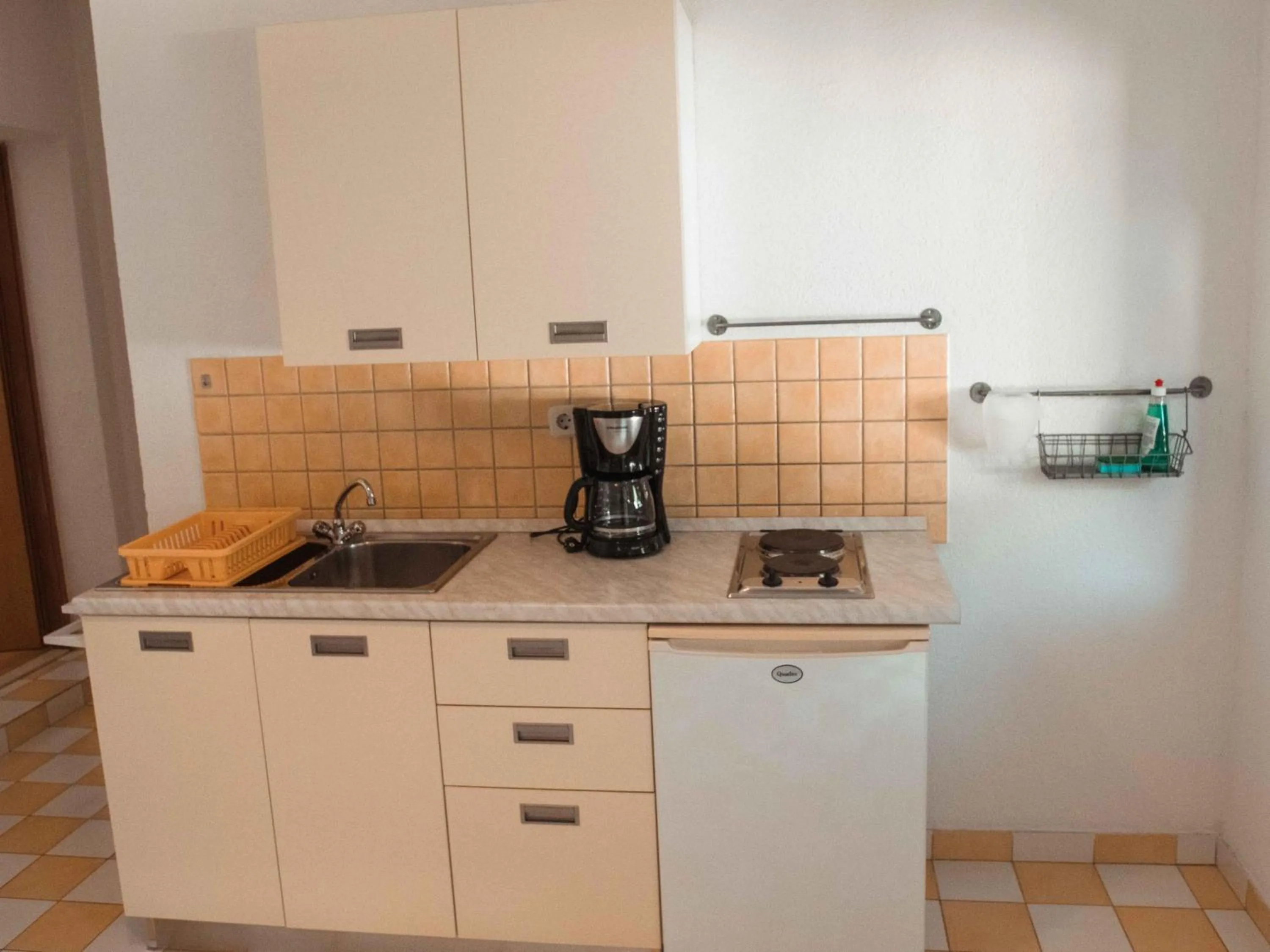 Kitchen or kitchenette in Apartments Yvonne