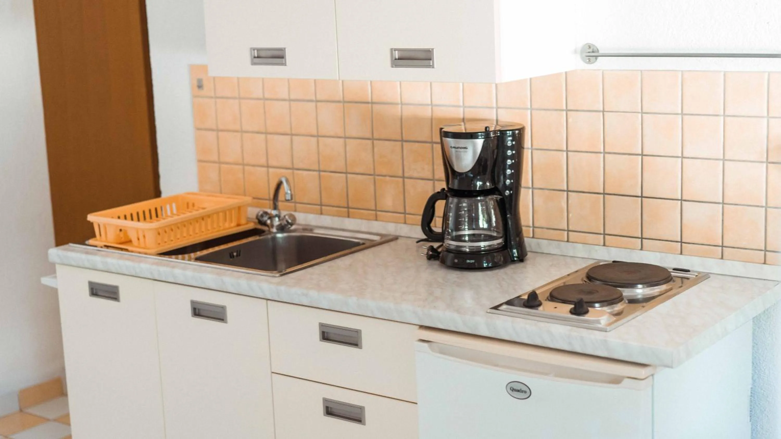 Kitchen or kitchenette in Apartments Yvonne