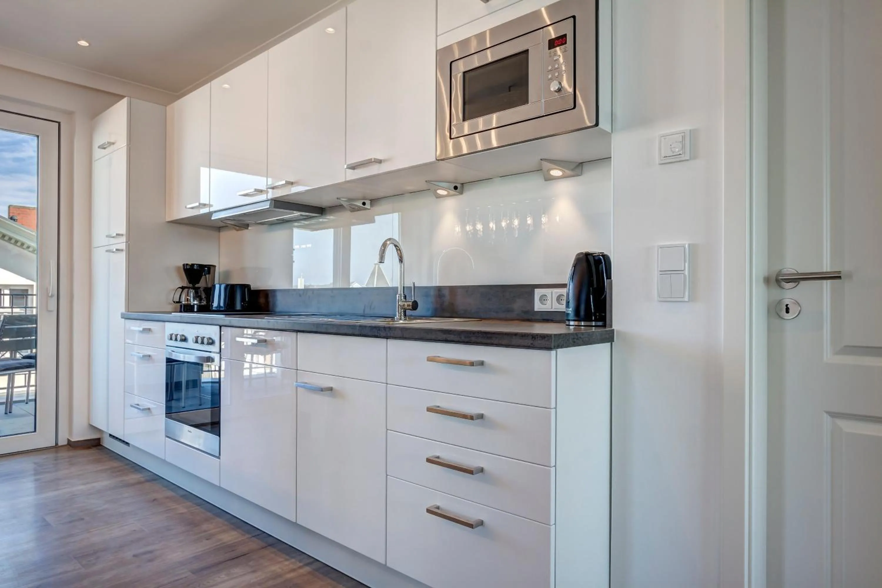 Kitchen or kitchenette in Aparthotel Villa Lea