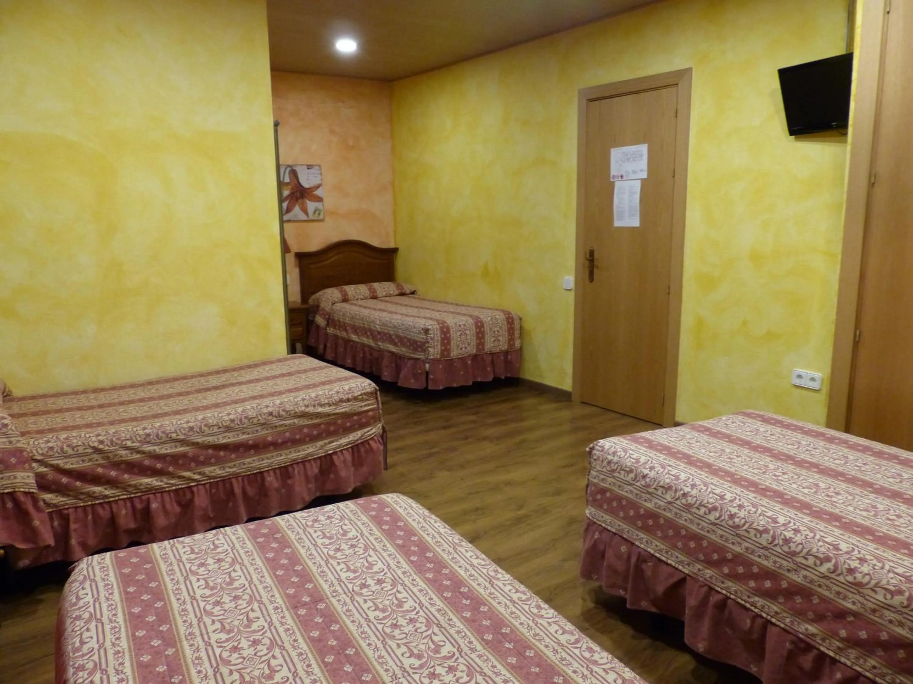 Bed in Hostal Vall D'Aneu by Arcas & Sambola