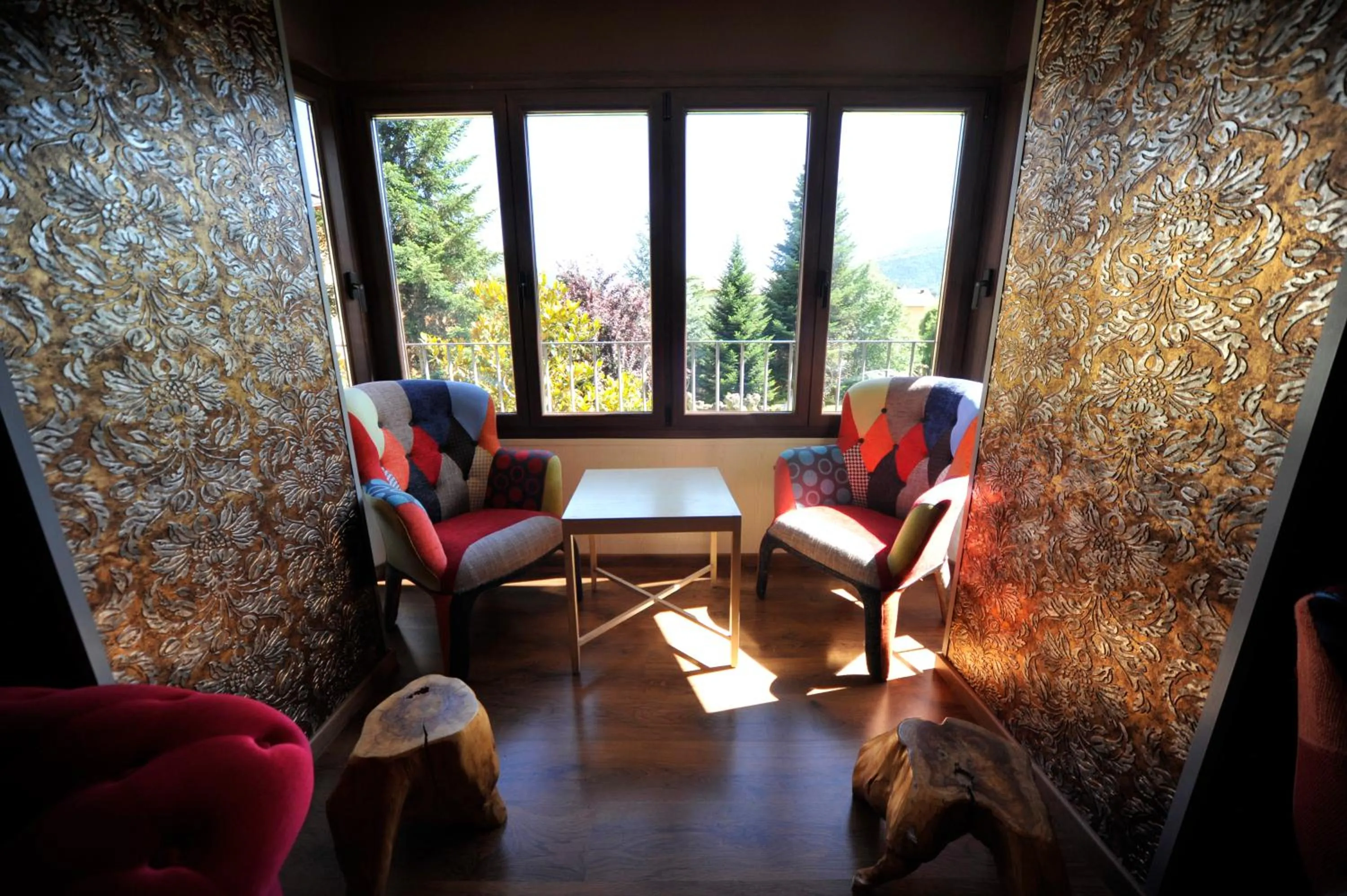 Communal lounge/ TV room in Hostal Vall D'Aneu by Arcas & Sambola