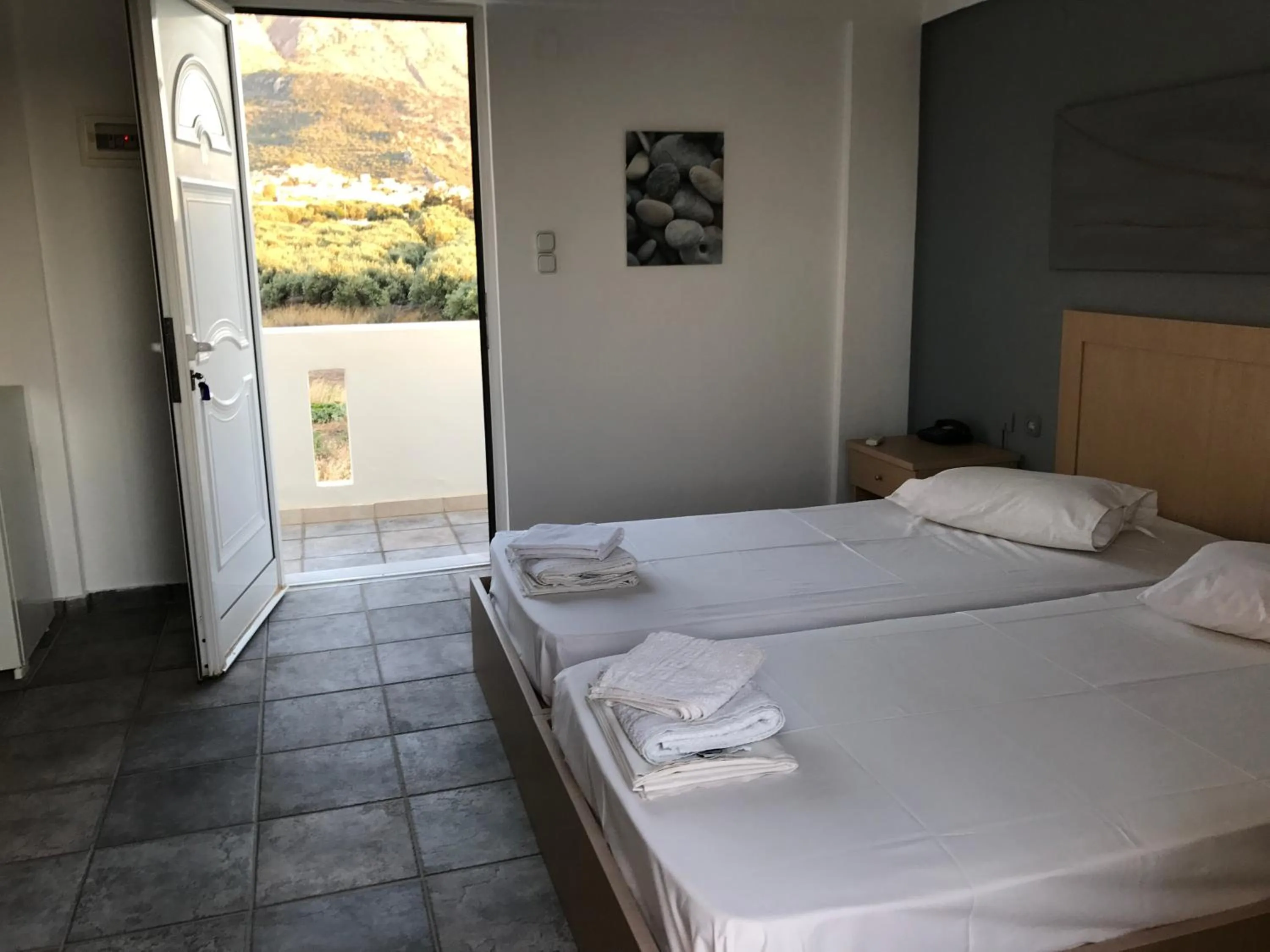 Natural landscape, Bed in Tholos Rooms