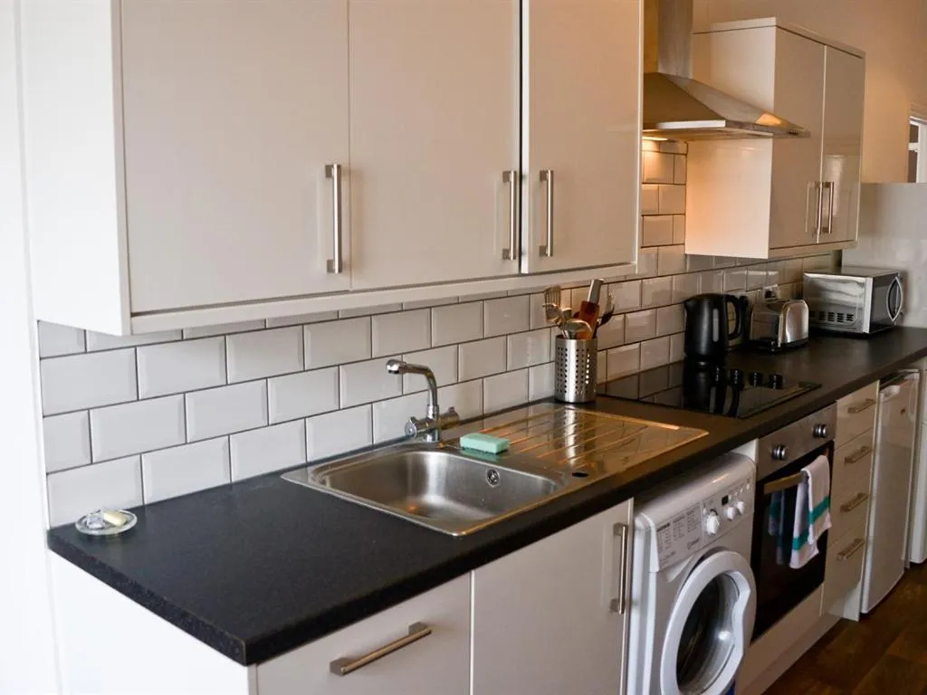 Bedroom in Corner House apartment