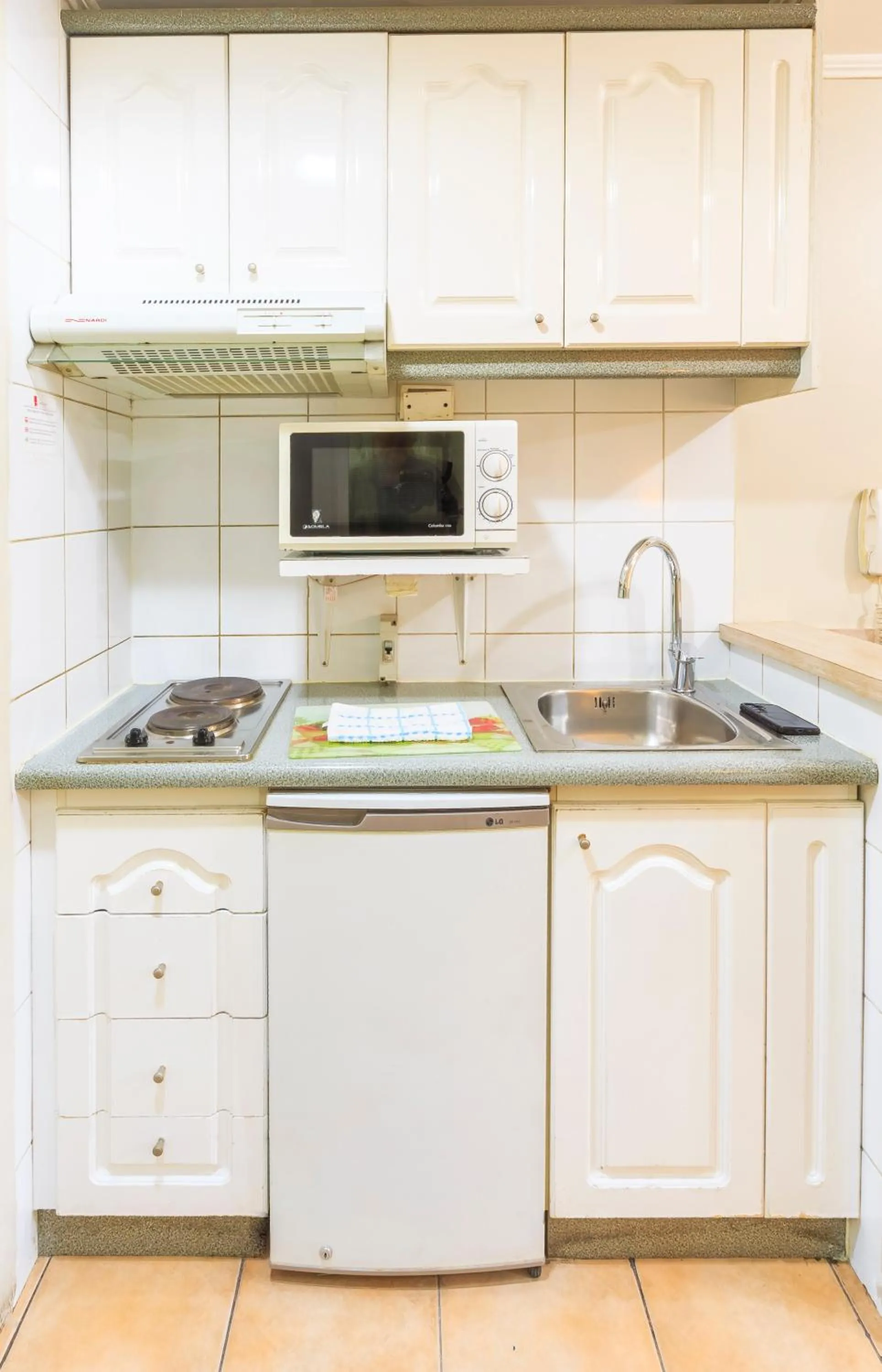 Kitchen or kitchenette in Apart Hotel Cambiaso
