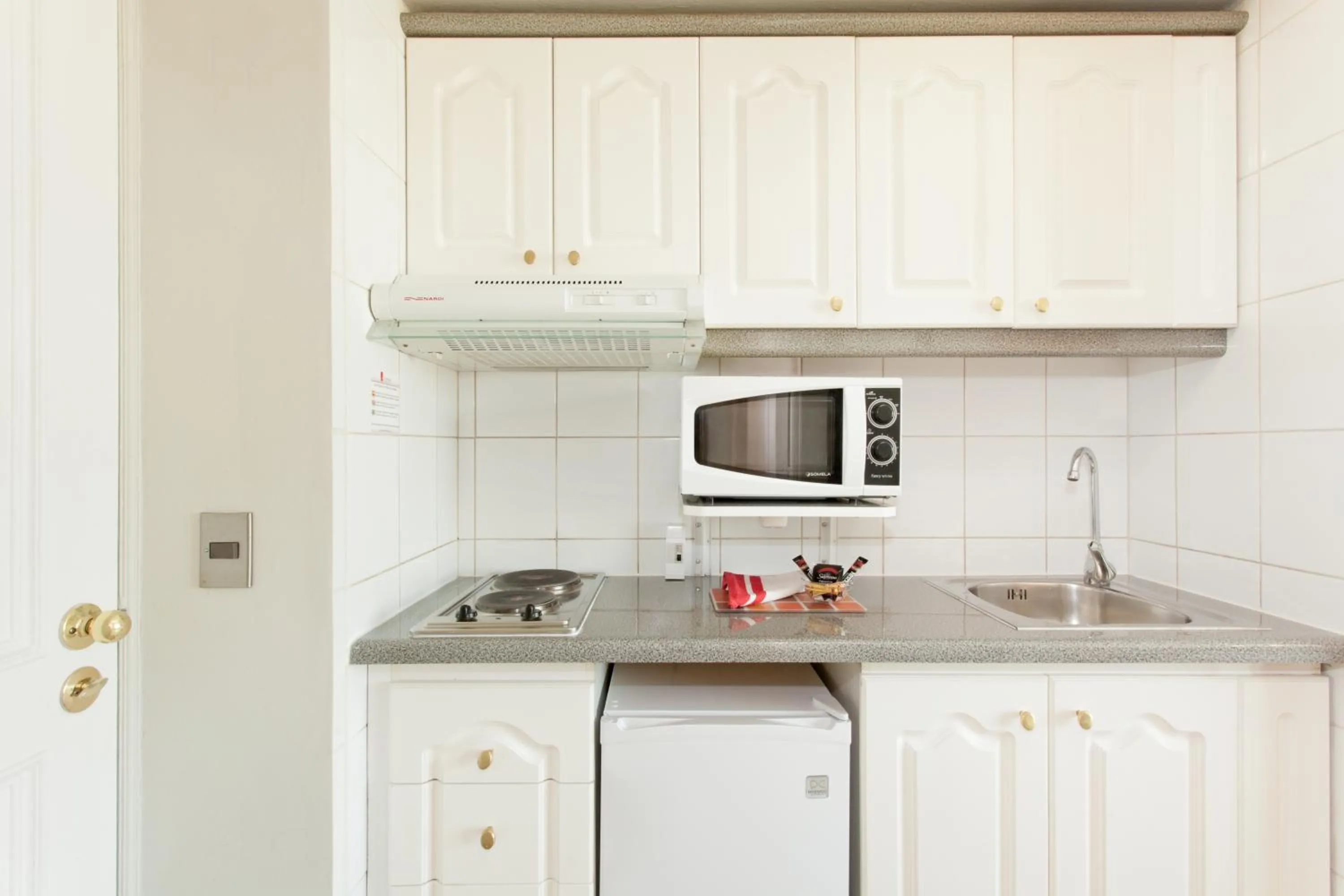 Kitchen or kitchenette in Apart Hotel Cambiaso