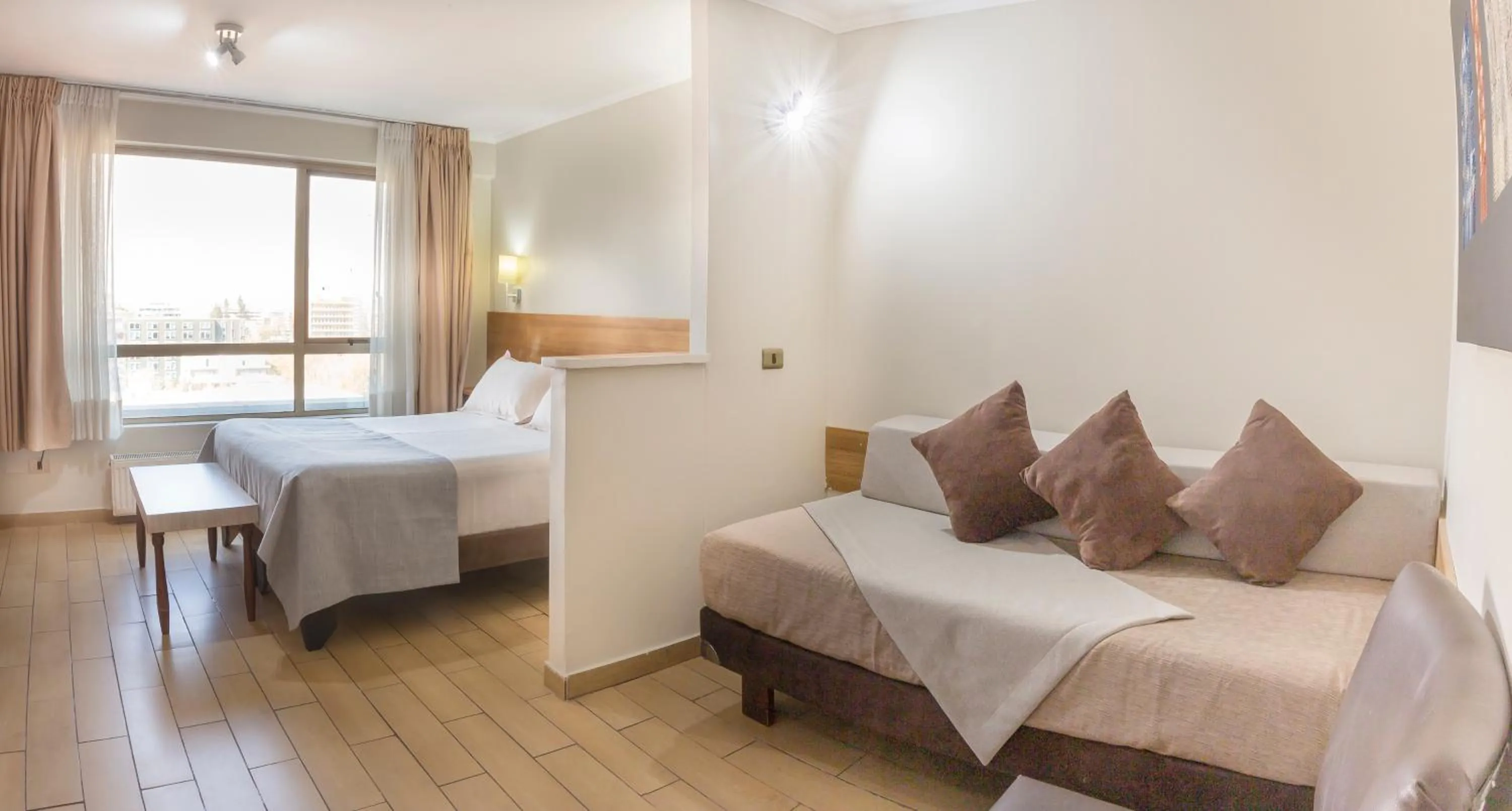 Bed in Apart Hotel Cambiaso