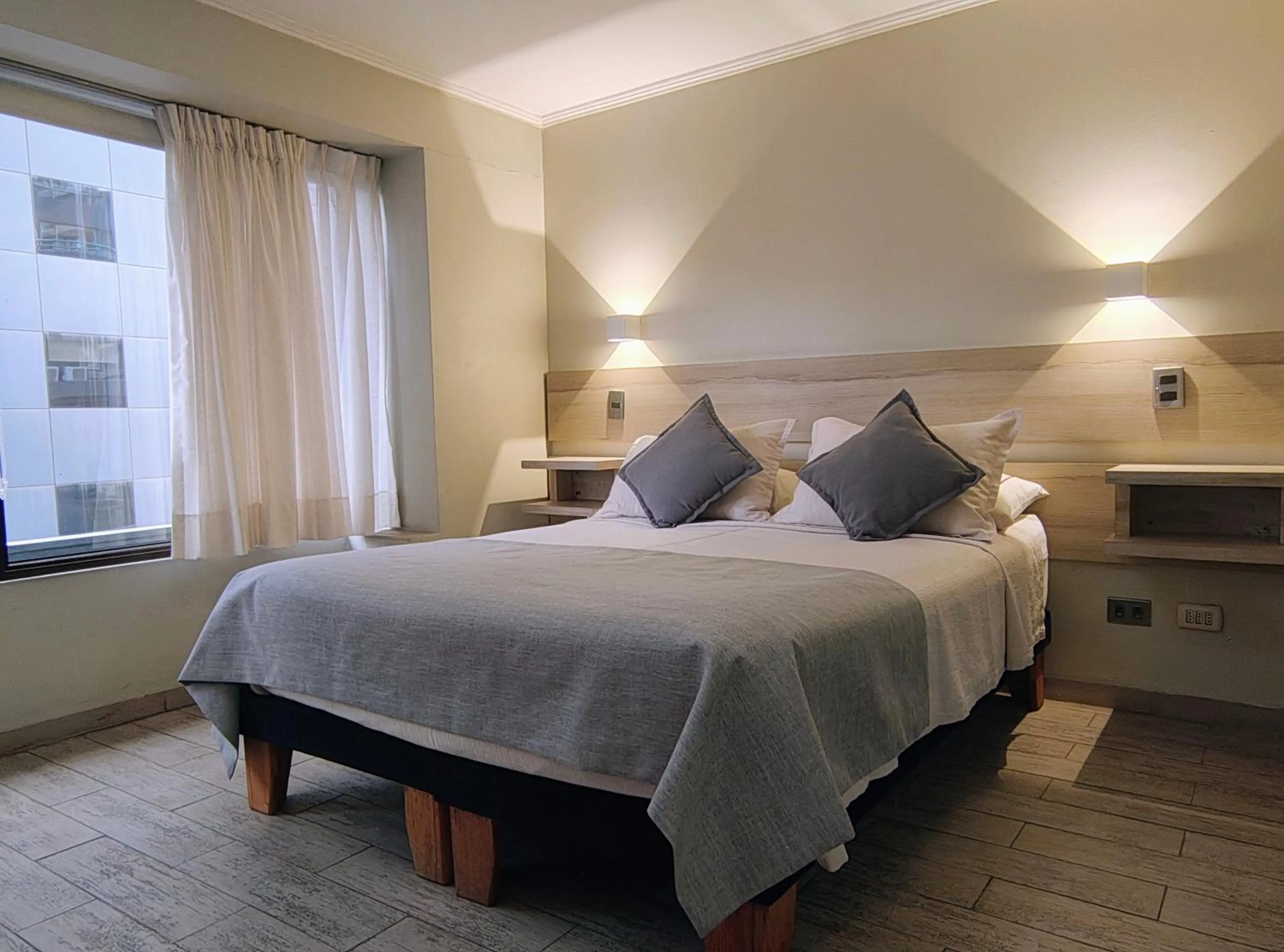 Bed in Apart Hotel Cambiaso