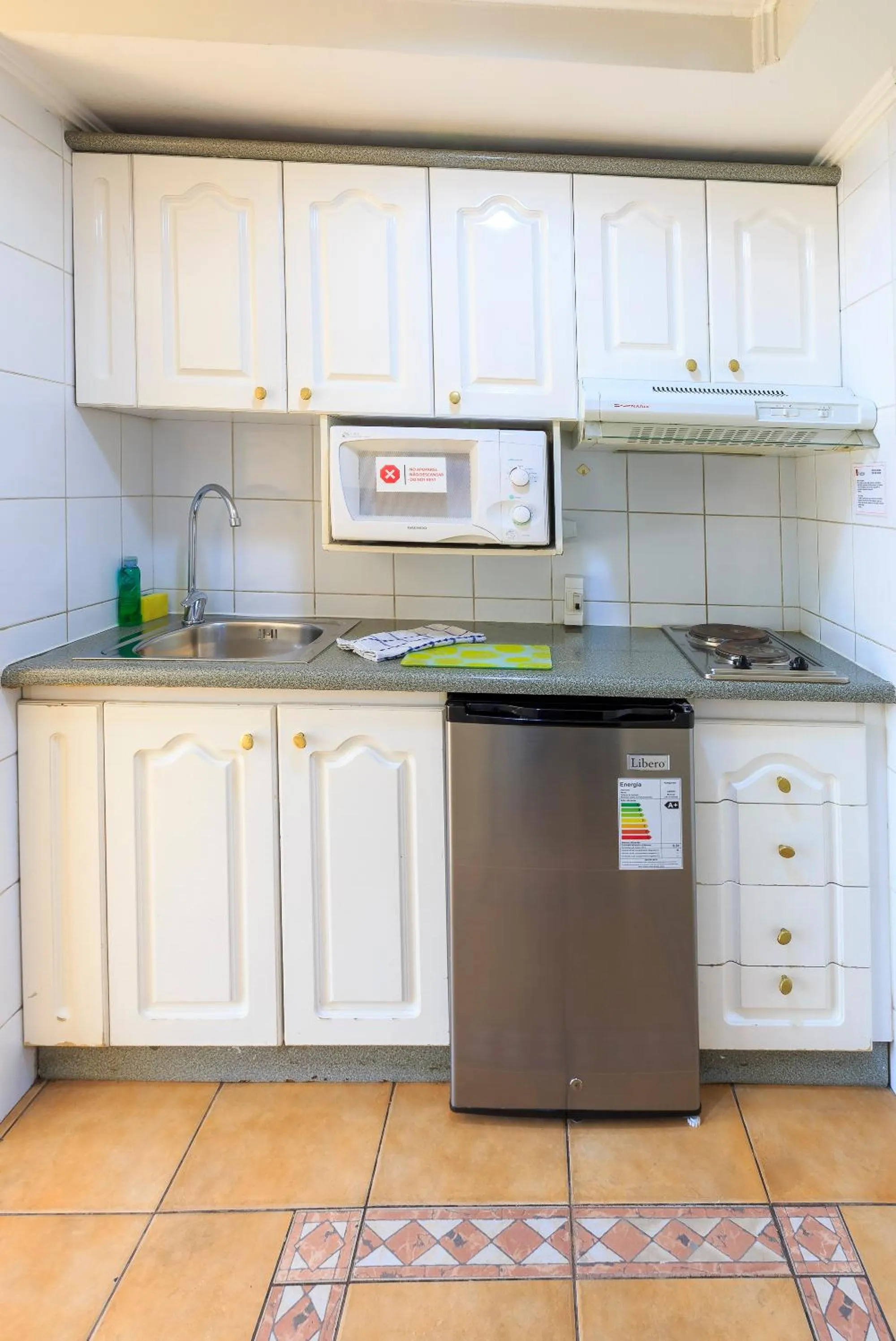 Kitchen or kitchenette in Apart Hotel Cambiaso