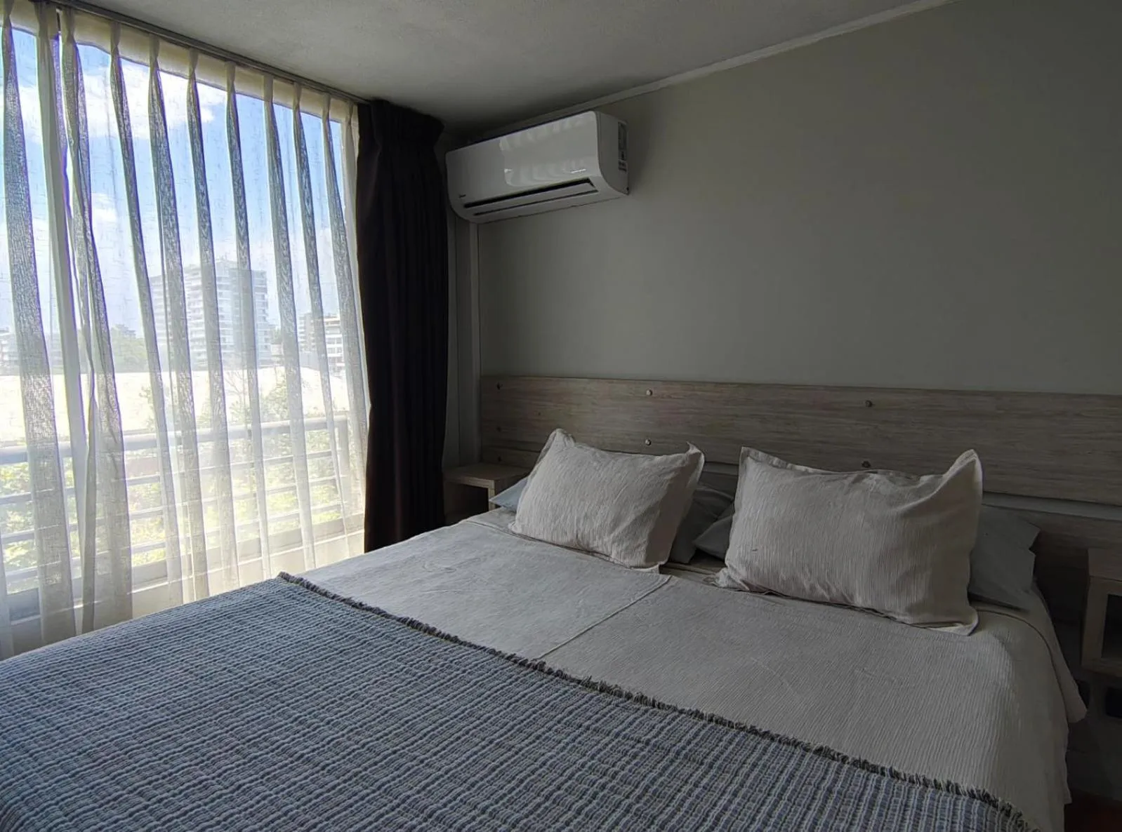 Bed in Apart Hotel Cambiaso