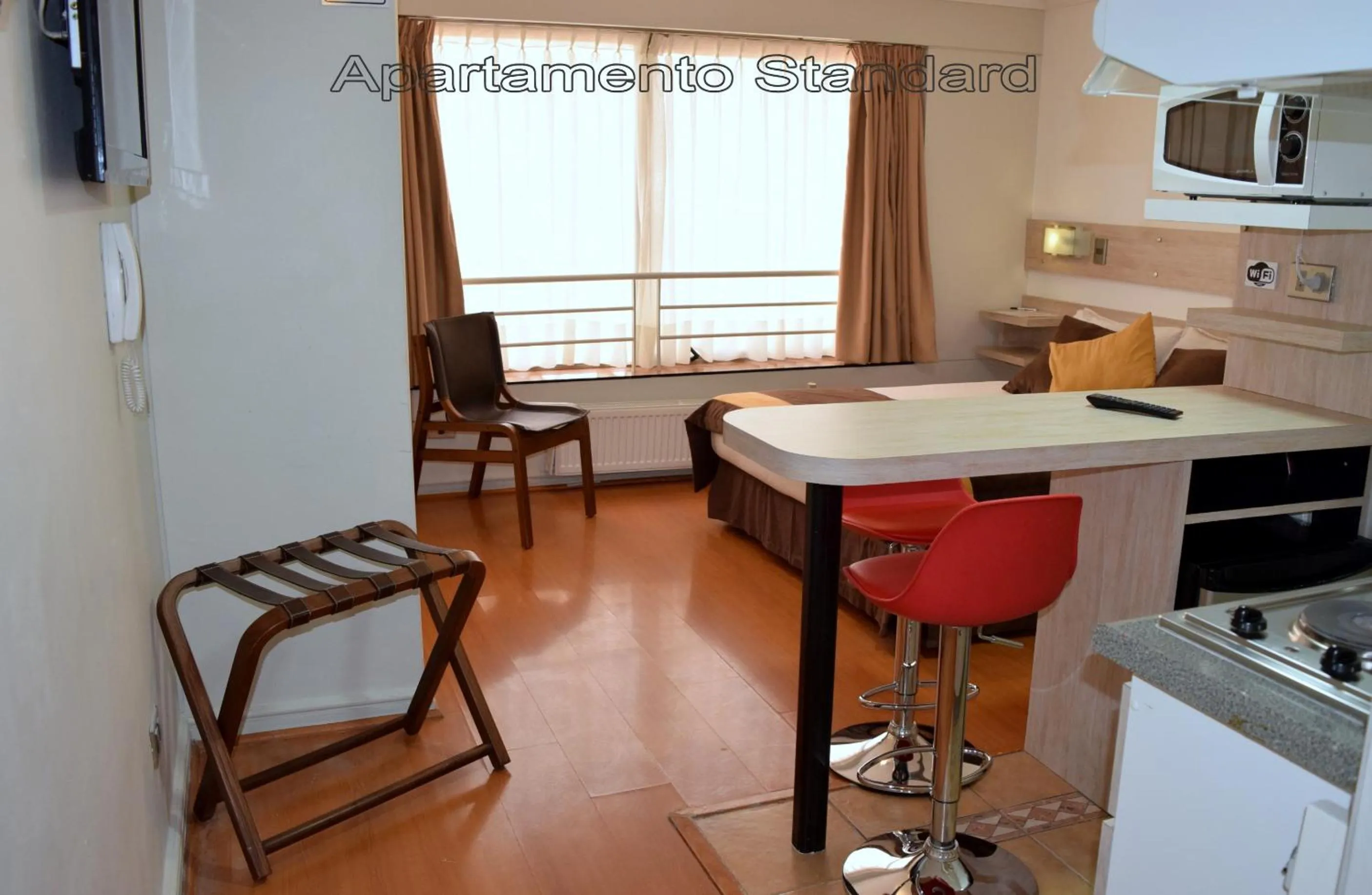 Photo of the whole room in Apart Hotel Cambiaso