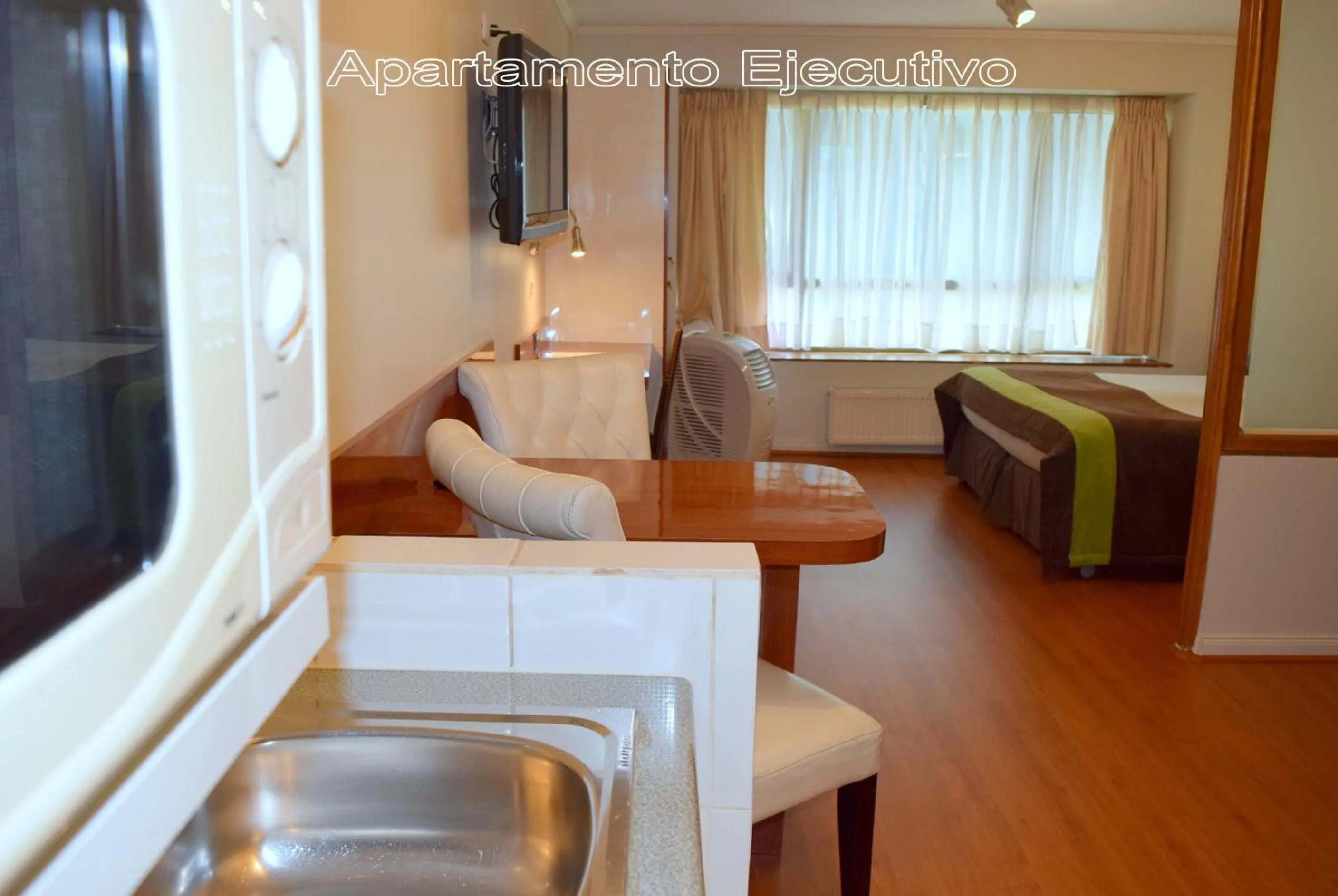 Photo of the whole room in Apart Hotel Cambiaso