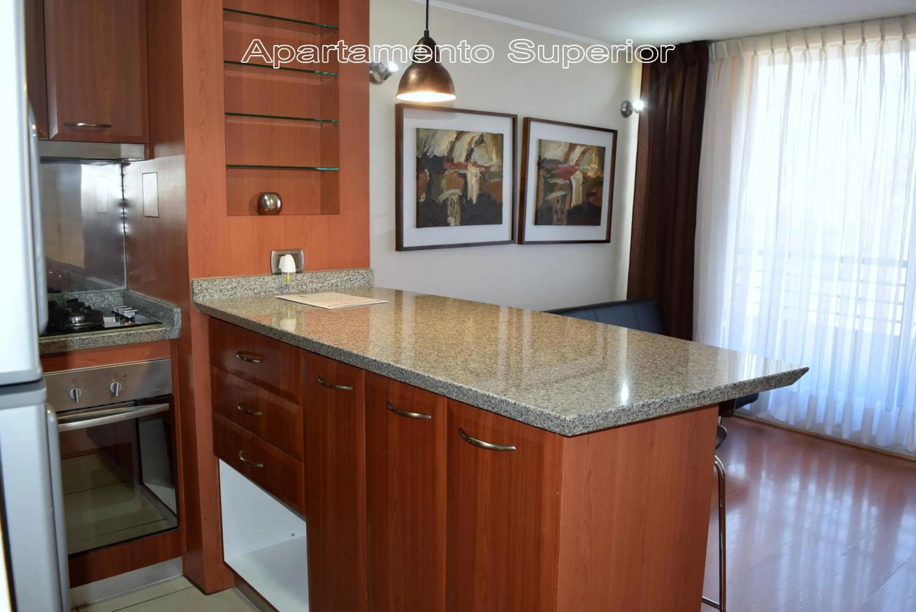 Photo of the whole room in Apart Hotel Cambiaso