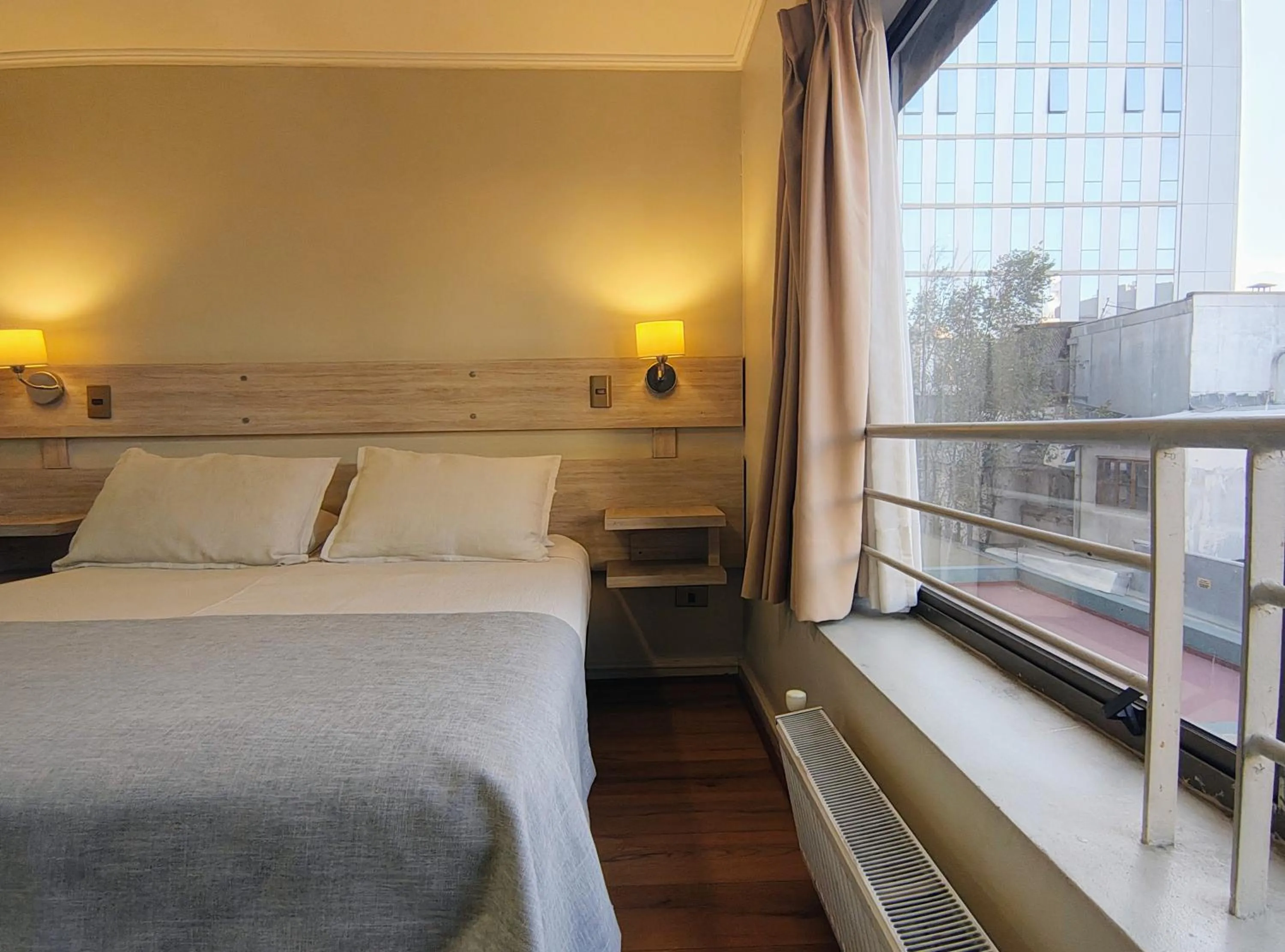 Bed in Apart Hotel Cambiaso