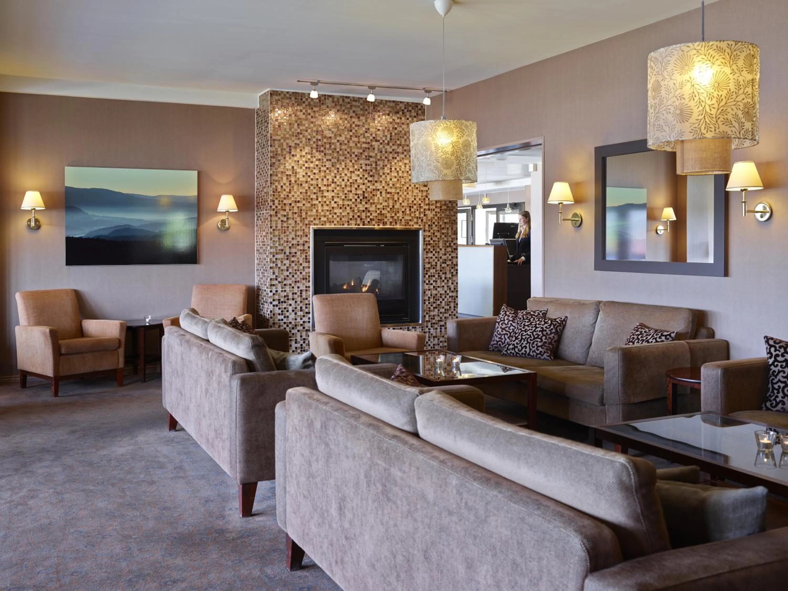 Communal lounge/ TV room in Tyrifjord Hotell